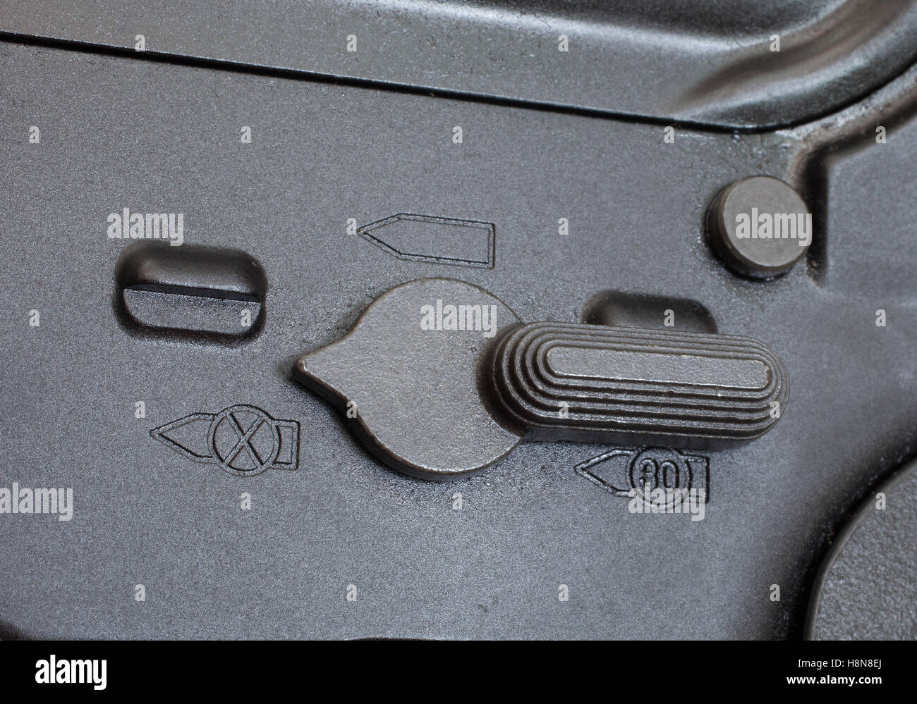 Gun Switch Numbers Switch on the side of a rifle that puts the gun on safe Stock Photo - Alamy