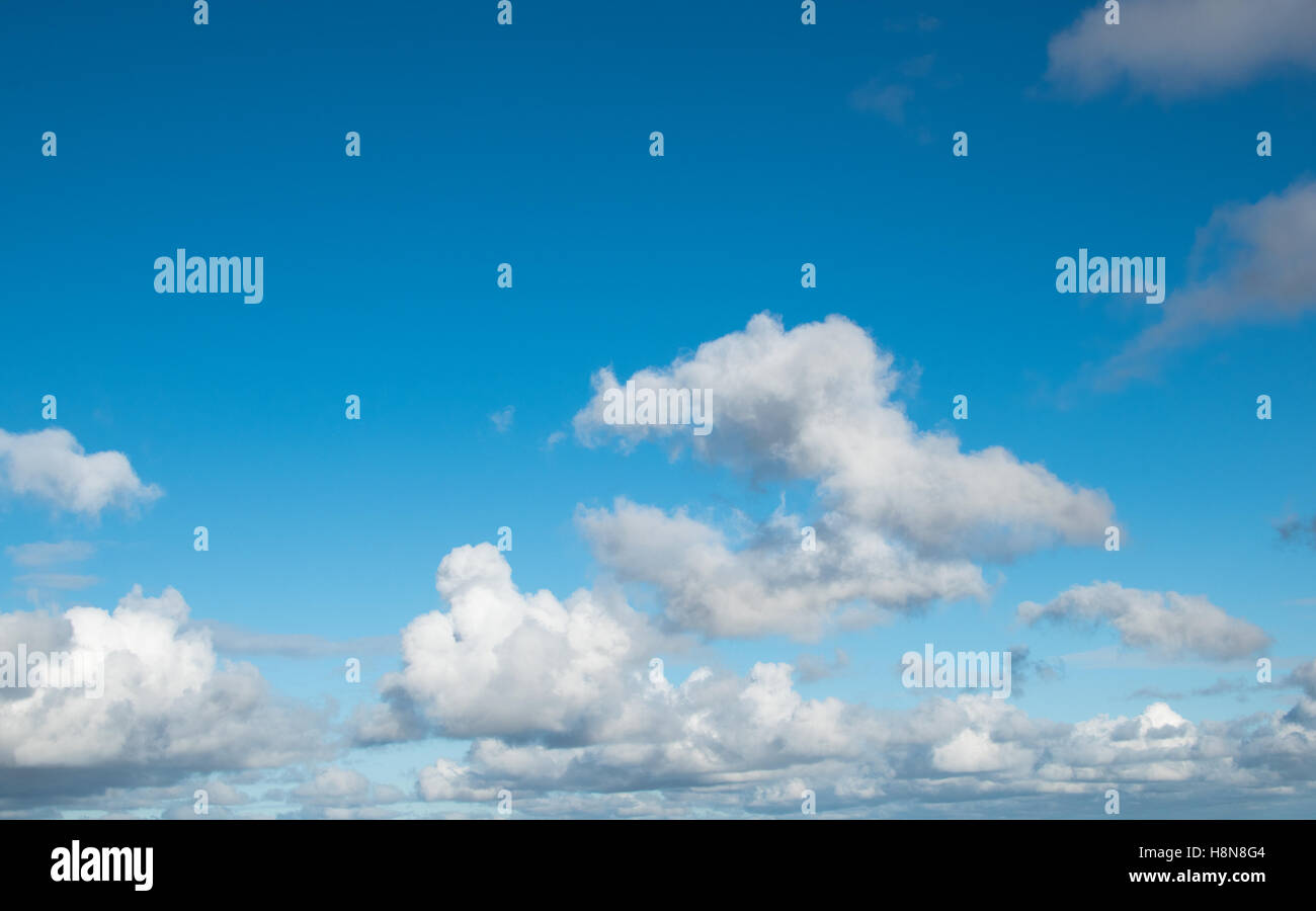 Cumulus Clouds against a blue sky Stock Photo