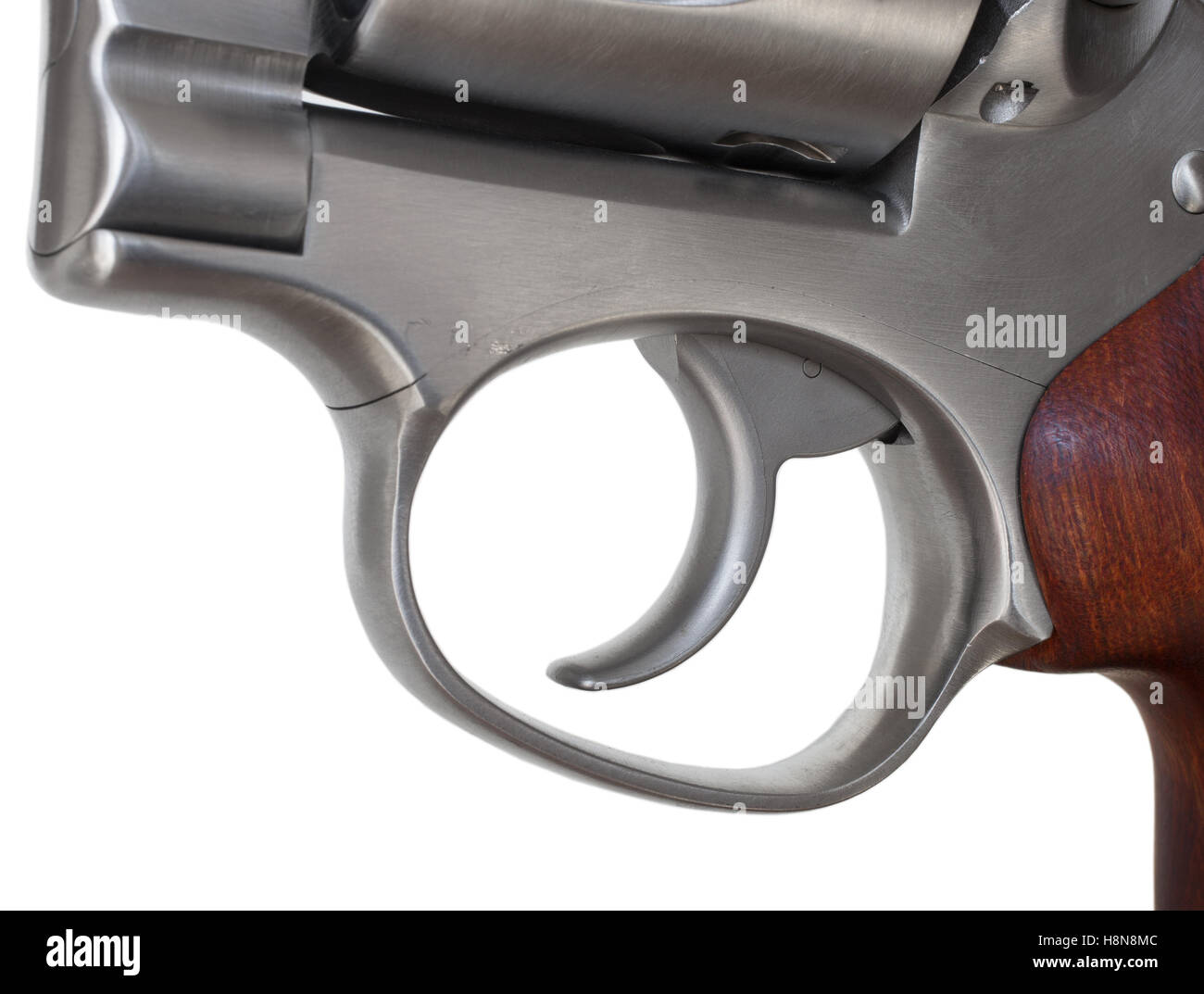 Trigger on a double action revolver isolated on white Stock Photo
