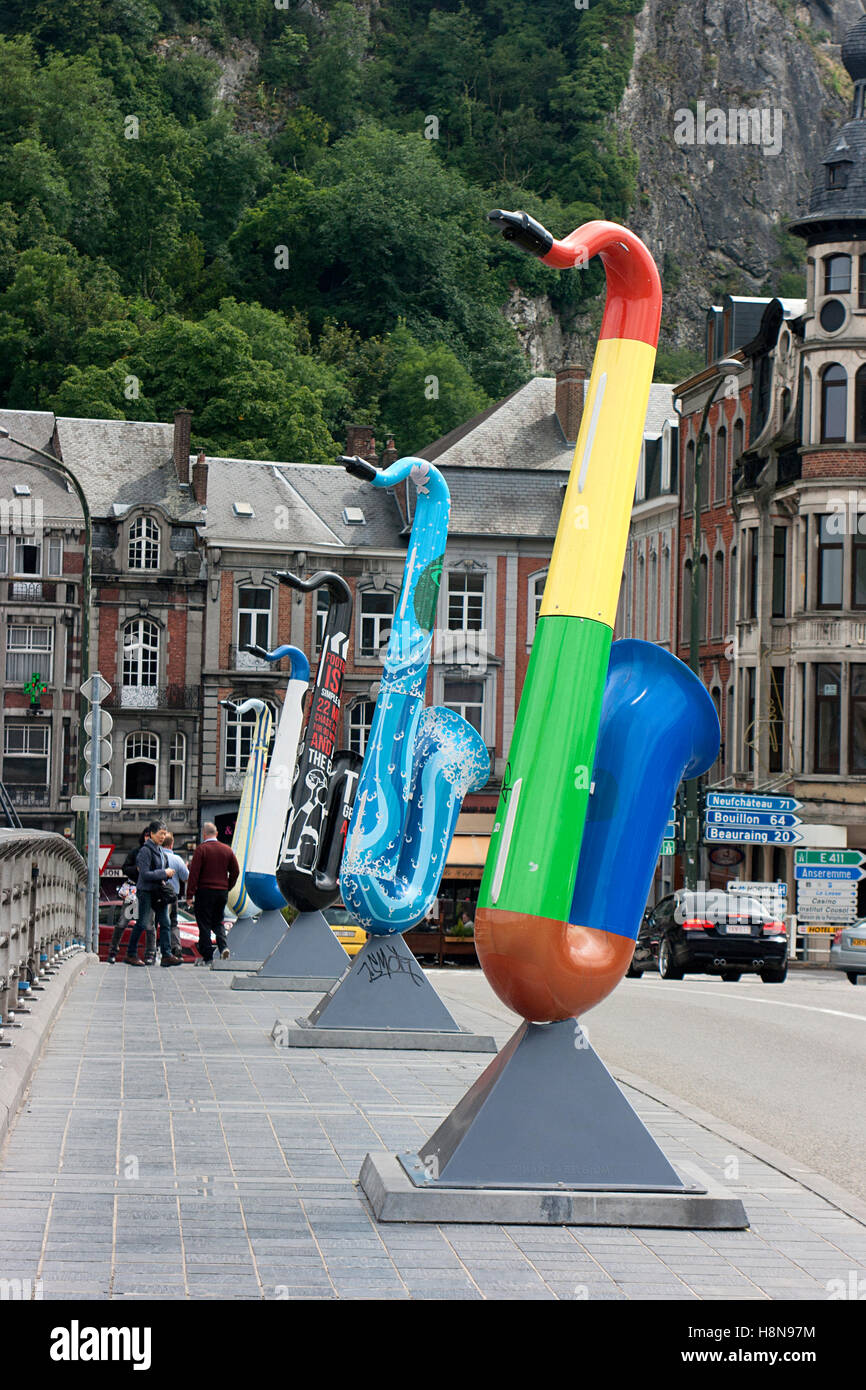 Colourful sculptures of saxophones at Charles de Gaulle Bridge, Dinant, Belgium Stock Photo