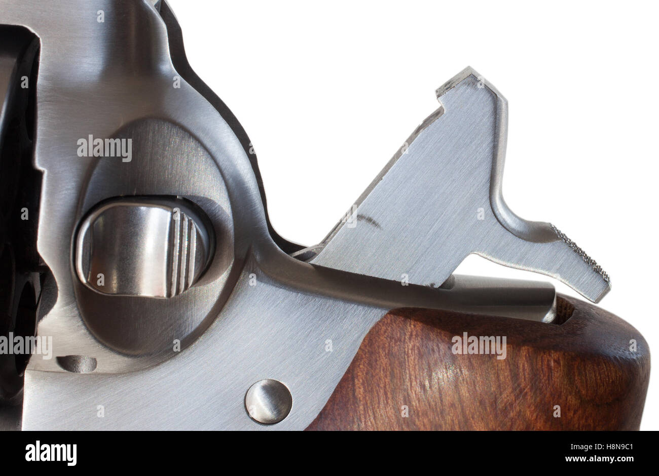Hammer on a double action revolver back and ready to shoot Stock Photo