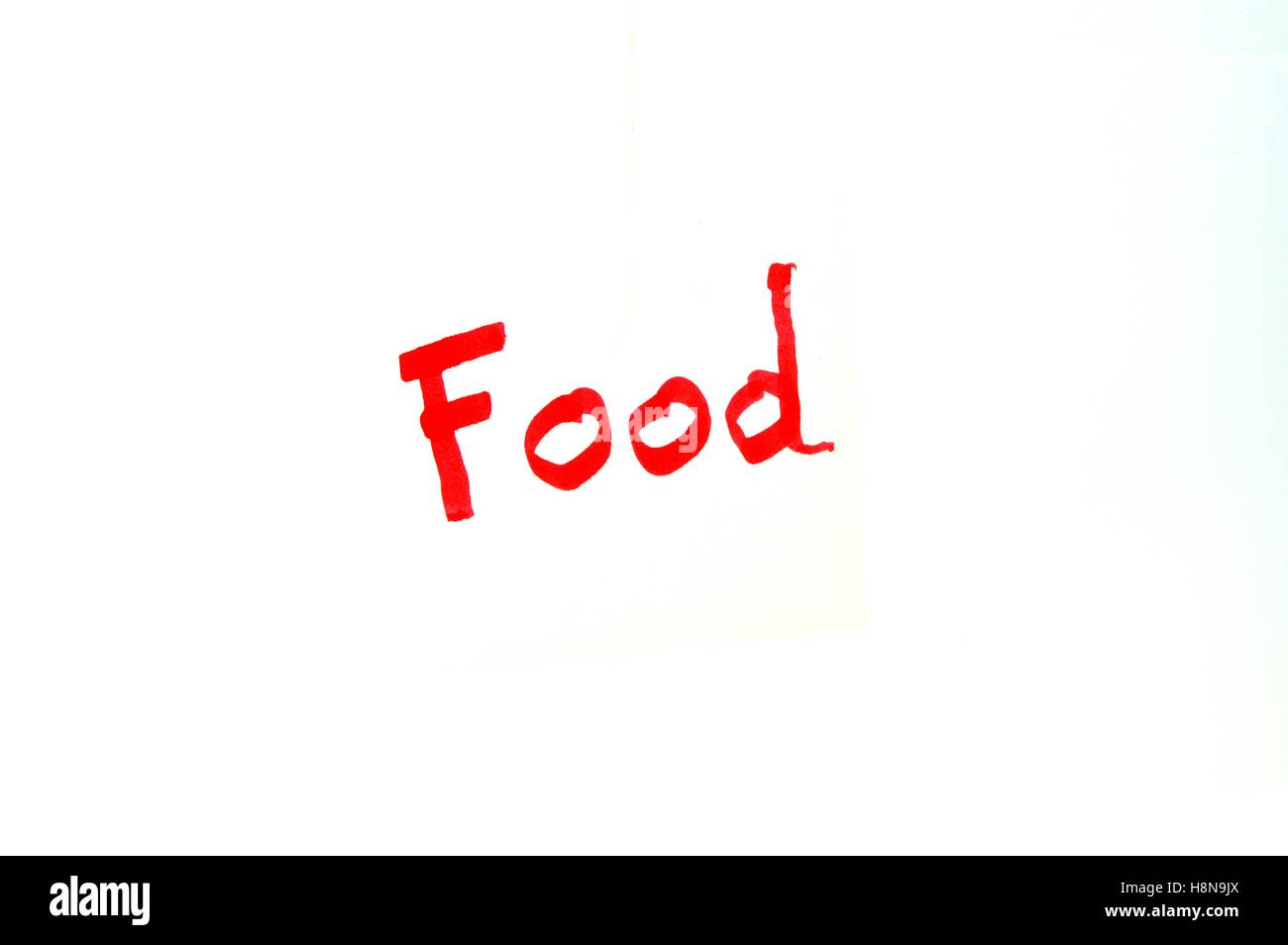 Mot Food written in red letters on white background Stock Photo
