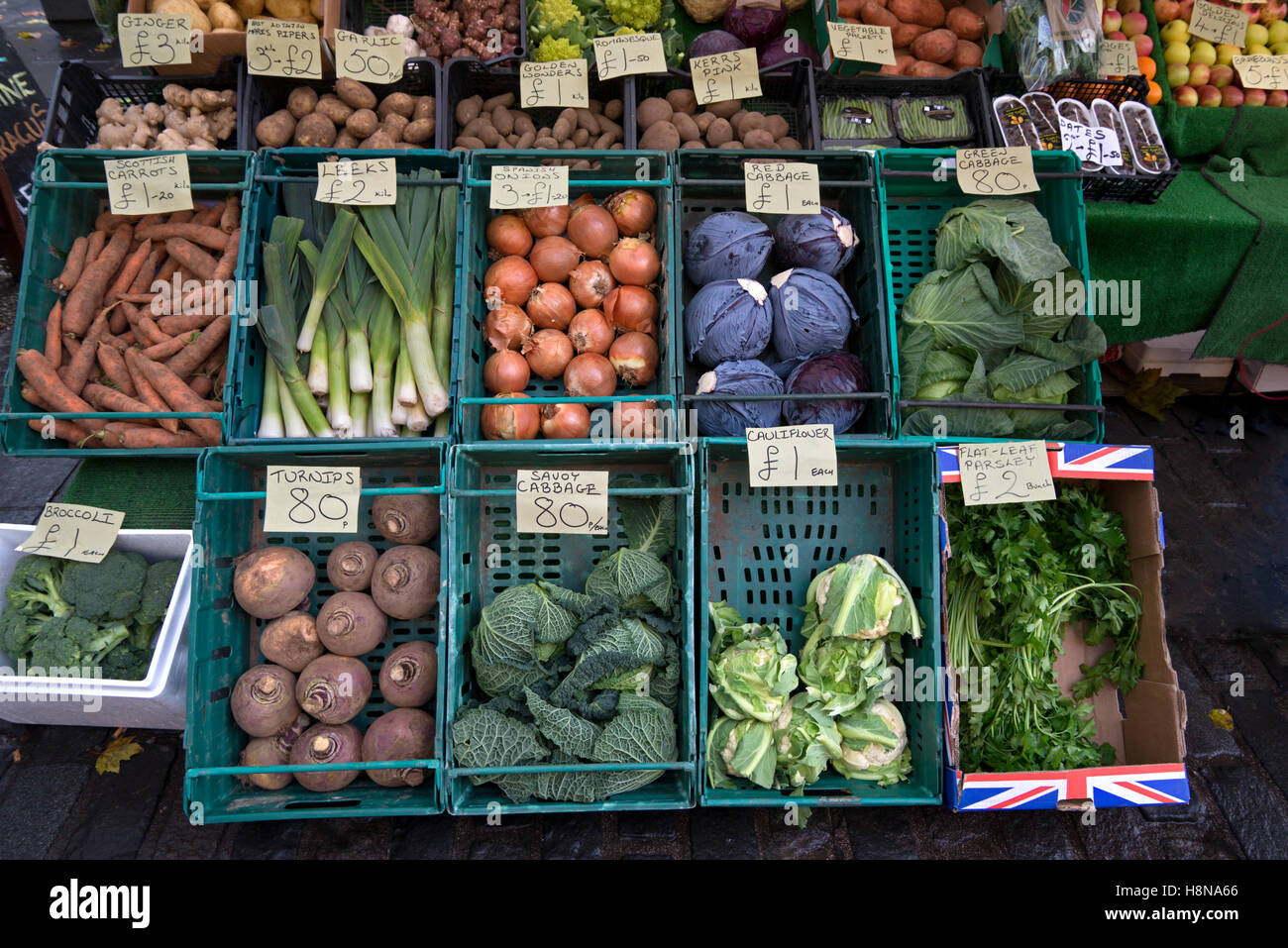 A selection of winter vegetables on sale at an outdoor market stall in the Grassmarket, Edinburgh, UK. Stock Photo