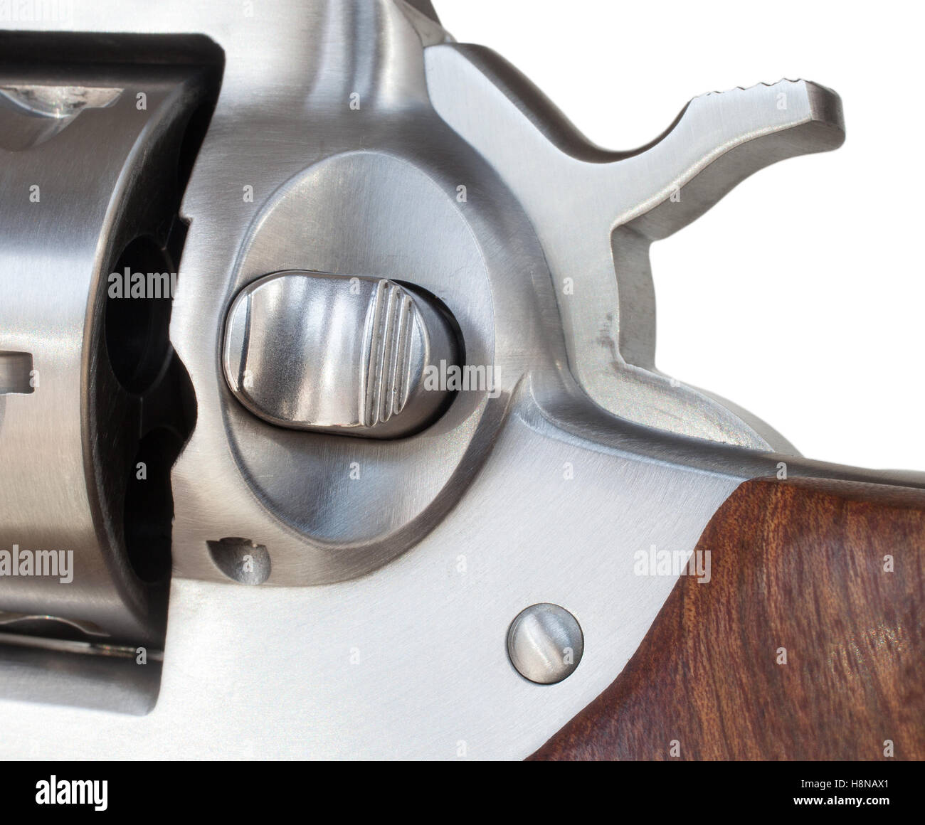 Button used to release the cylinder on a double action revolver Stock Photo