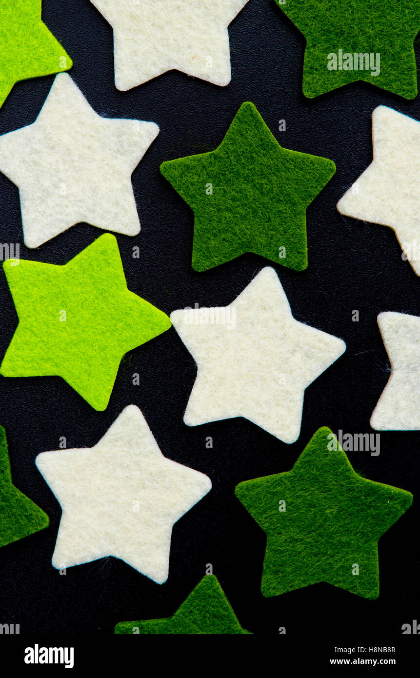 white and green stars over black background Stock Photo - Alamy