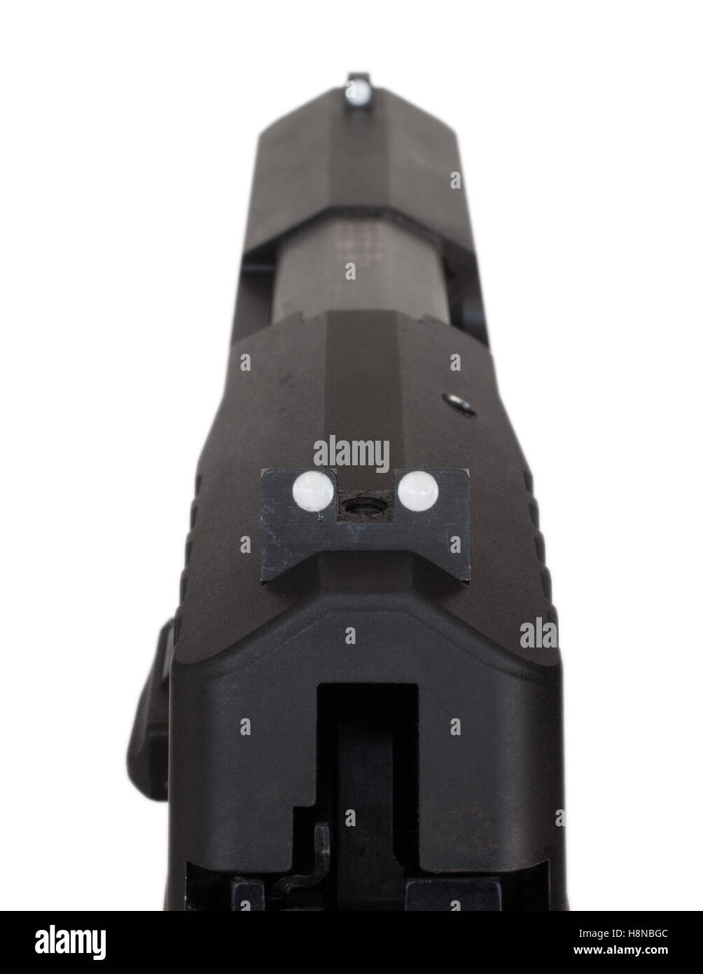Sights on the top of a handgun that have three dots for aiming Stock