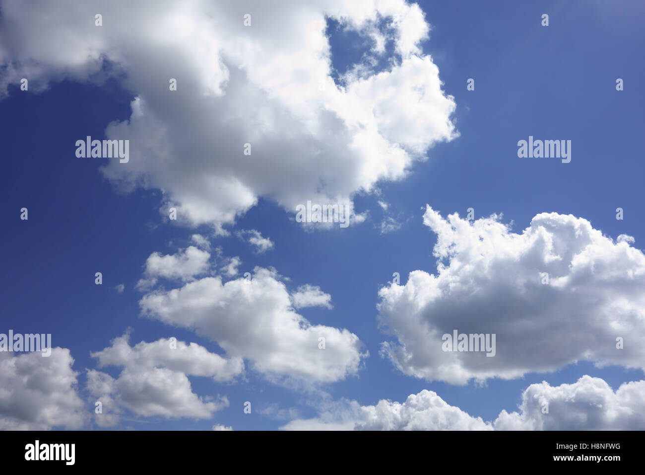 white clouds floating on a background of blue sky Stock Photo - Alamy