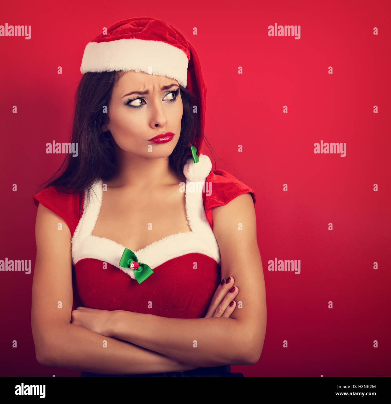 Red Offend Offended unhappy woman in trouble with folded arms on empty copy space ...