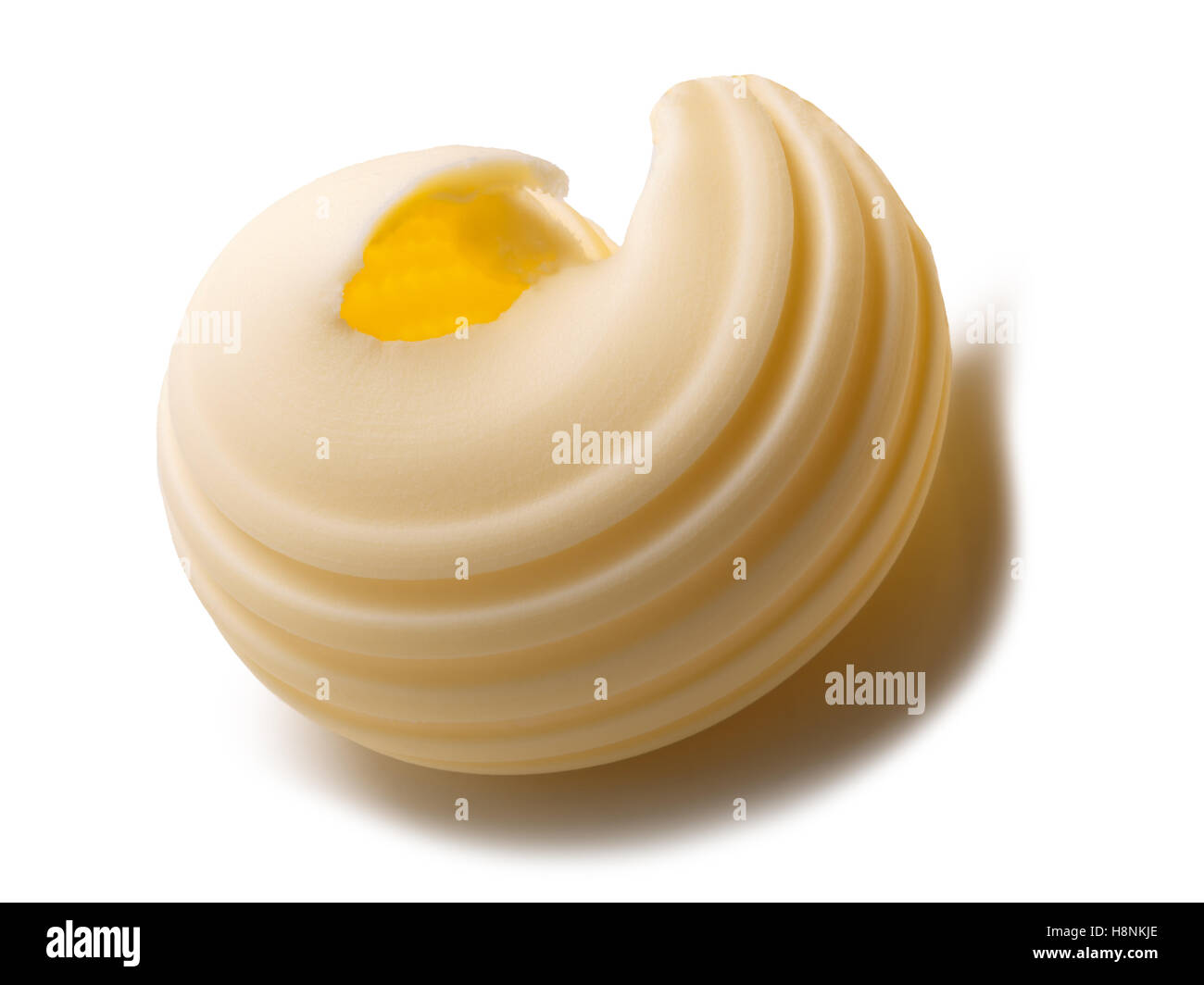 Butter curl or roll. Clipping paths, shadow separated Stock Photo