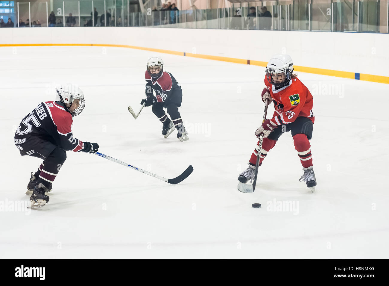 Game of children ice-hockey teams Stock Photo