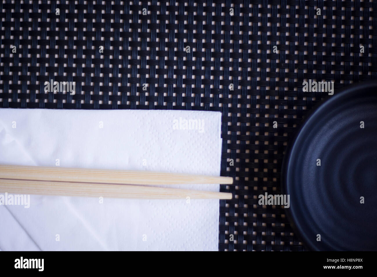 Asian chopsticks in Japanese restaurant to eat sushi and oriental