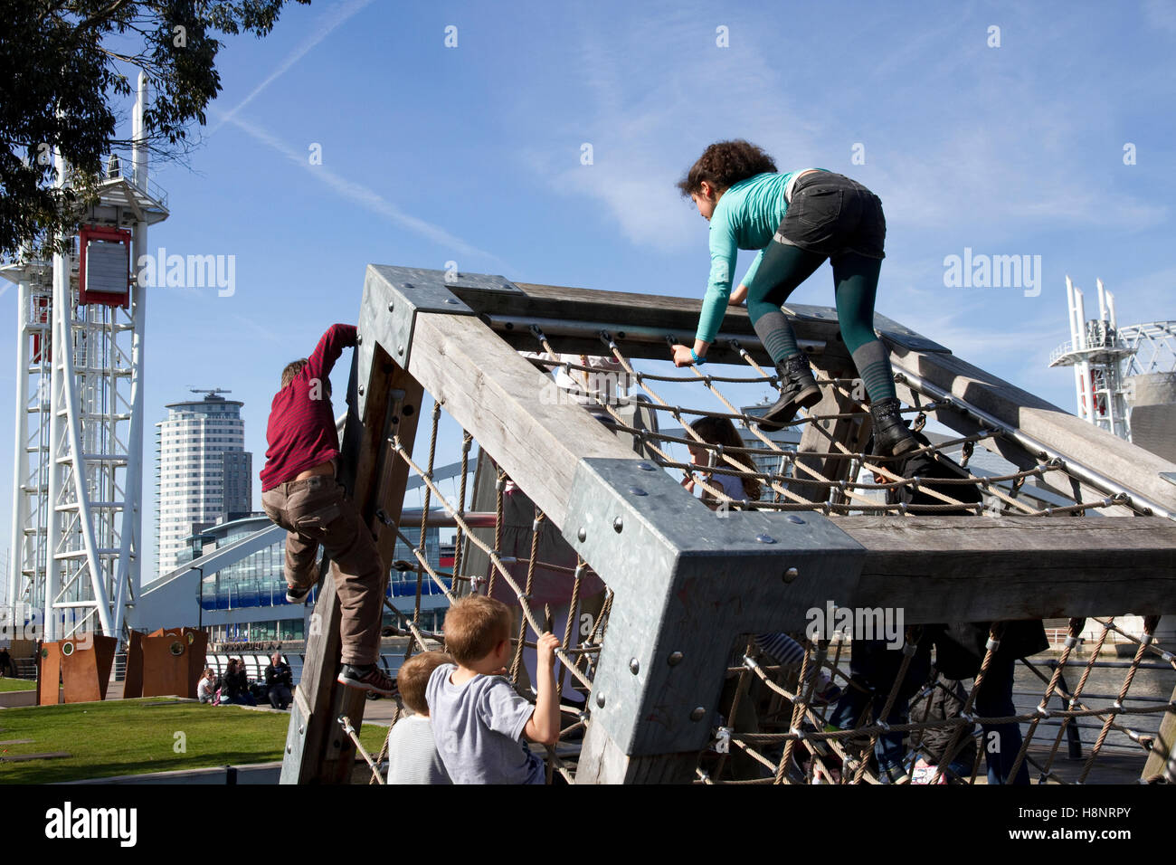 Children's climbing frame, Ribbon Park, Trafford Wharf, Salford Quays, Manchester, England, UK Stock Photo