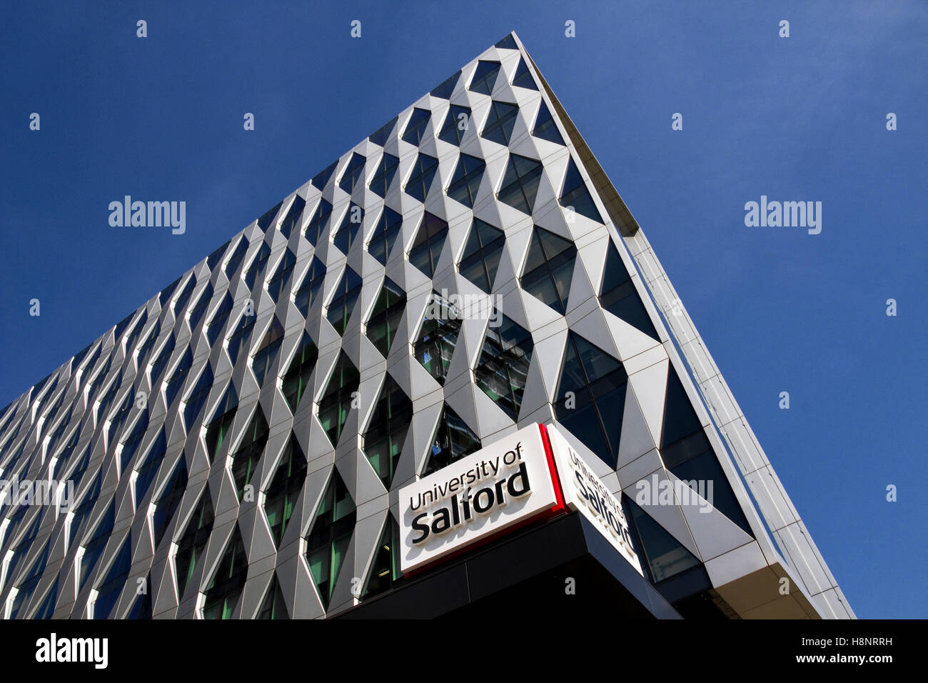 University of Salford, Orange Tower Building , Media City, Salford Quays, Salford, Greater Manchester, England, UK Stock Photo