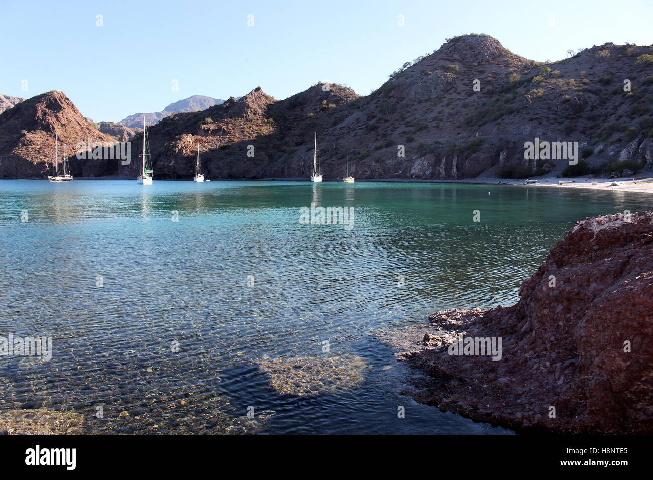 Boats anchored at Agua Verde, Baja California, Mexico Stock Photo