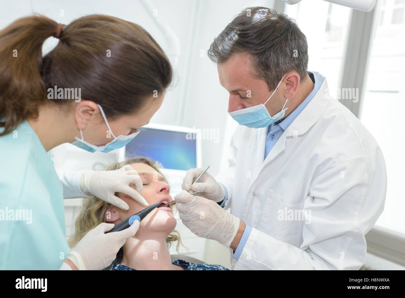 Closeup open mouth dental tools hi-res stock photography and images - Alamy