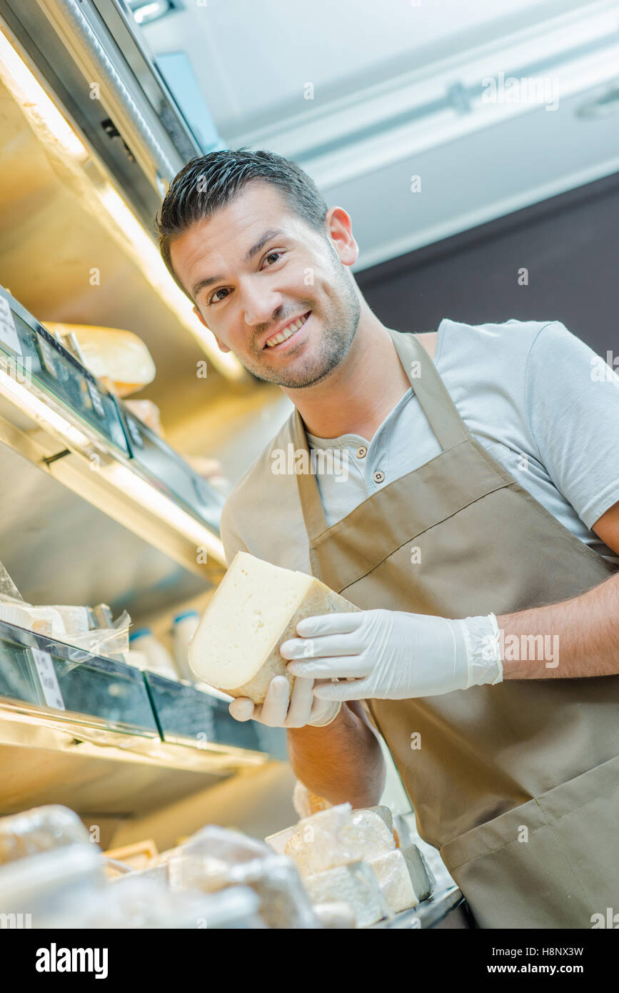 man holding cheese Stock Photo Alamy