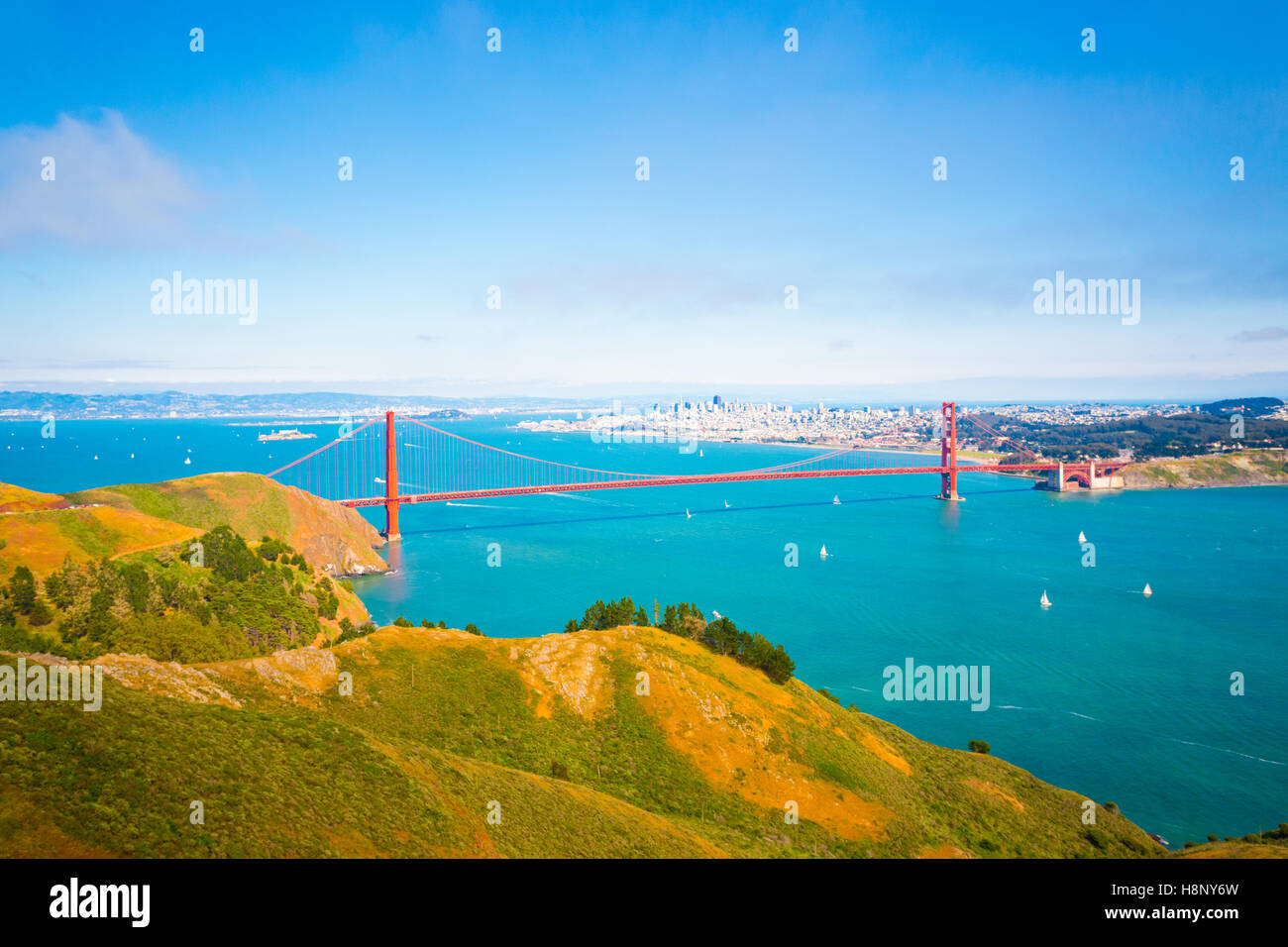 High angle, mid-air, aerial view of downtown San Francisco city, bay seen together with Golden Gate Bridge and hills of Marin he Stock Photo