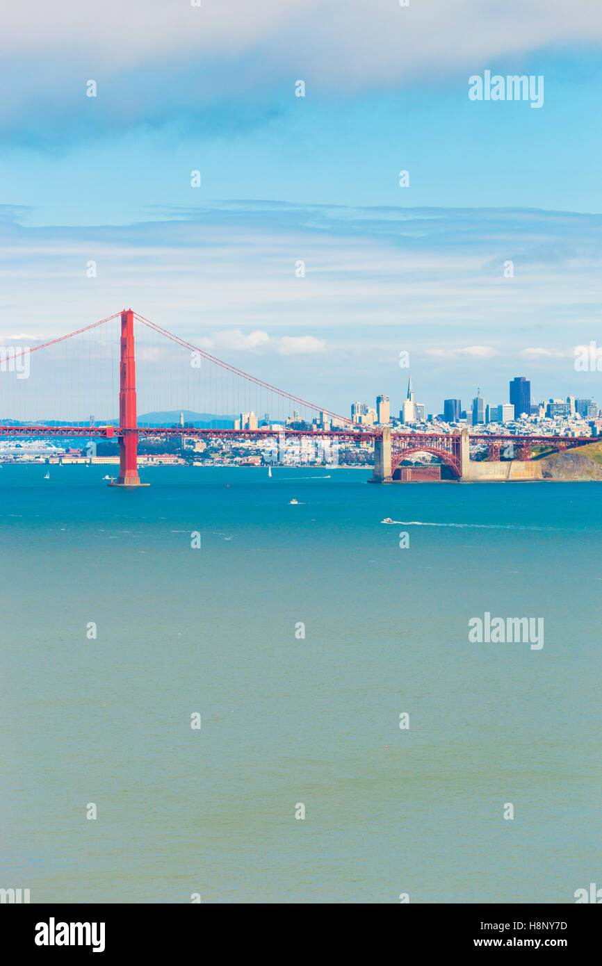 Distant telephoto landscape view from Marin over ocean water through Golden Gate Bridge to San Francisco cityscape Stock Photo