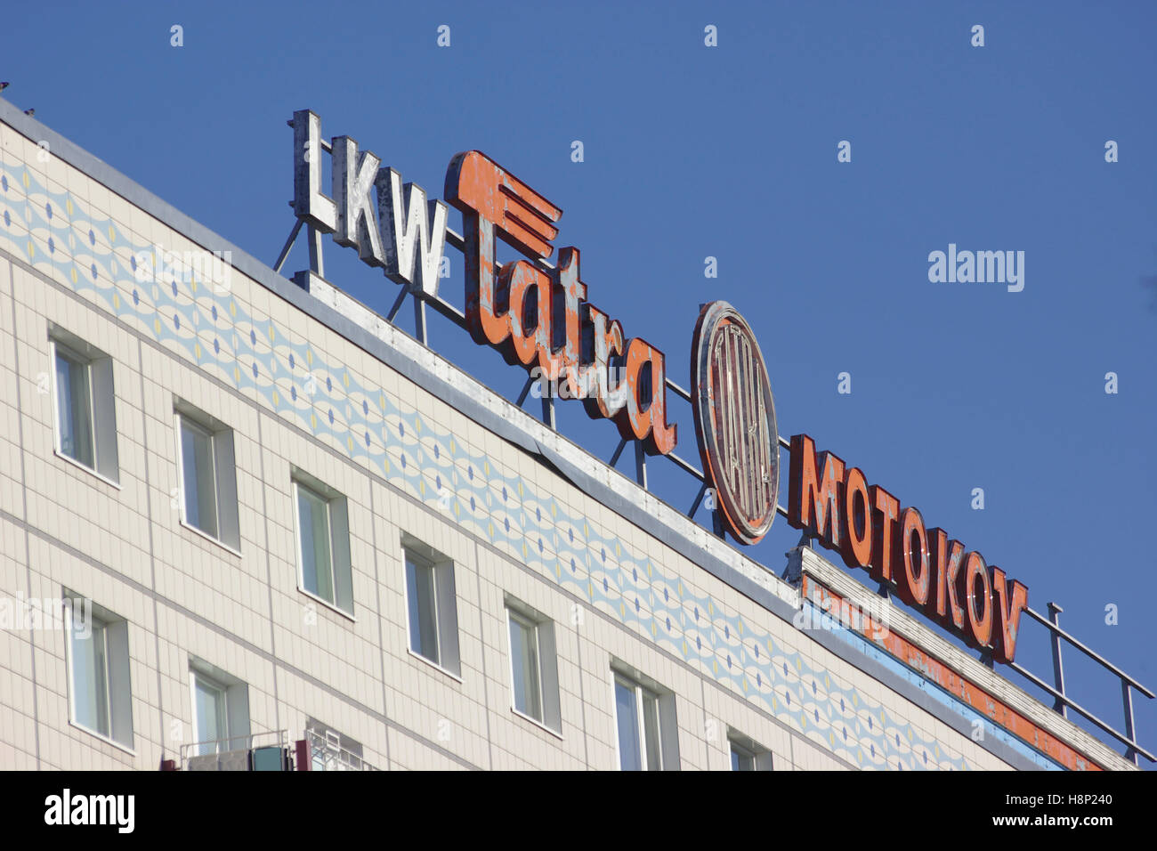 LKW Tartra Mokokov sign, DDR era Plattenbau on Karl-Marx-Allee, Berlin Stock Photo