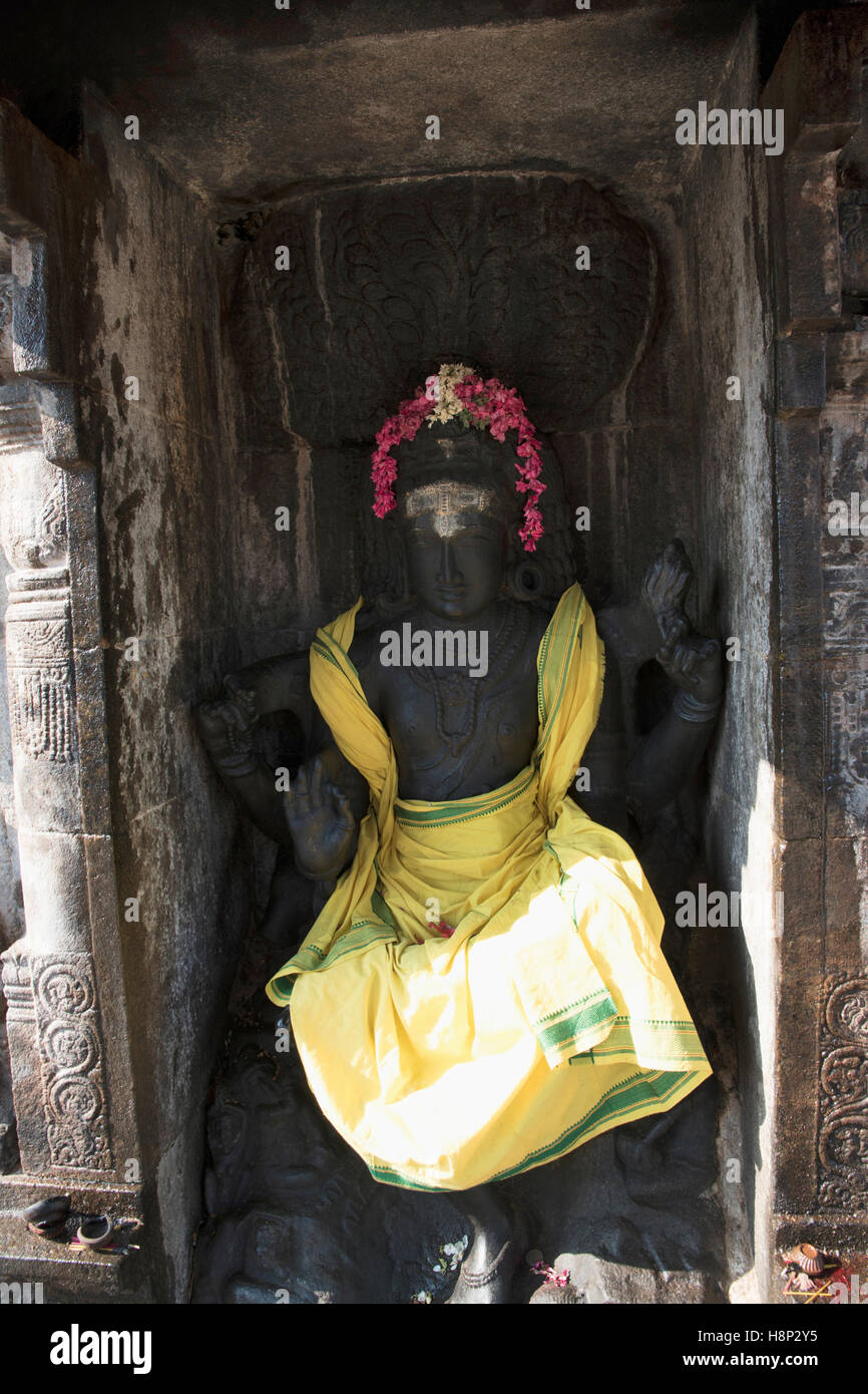 Dakshina-murti, attended by sages seated under a banayan tree, Airavatesvara Temple, Darasuram, Tamil Nadu, India. View from Sou Stock Photo