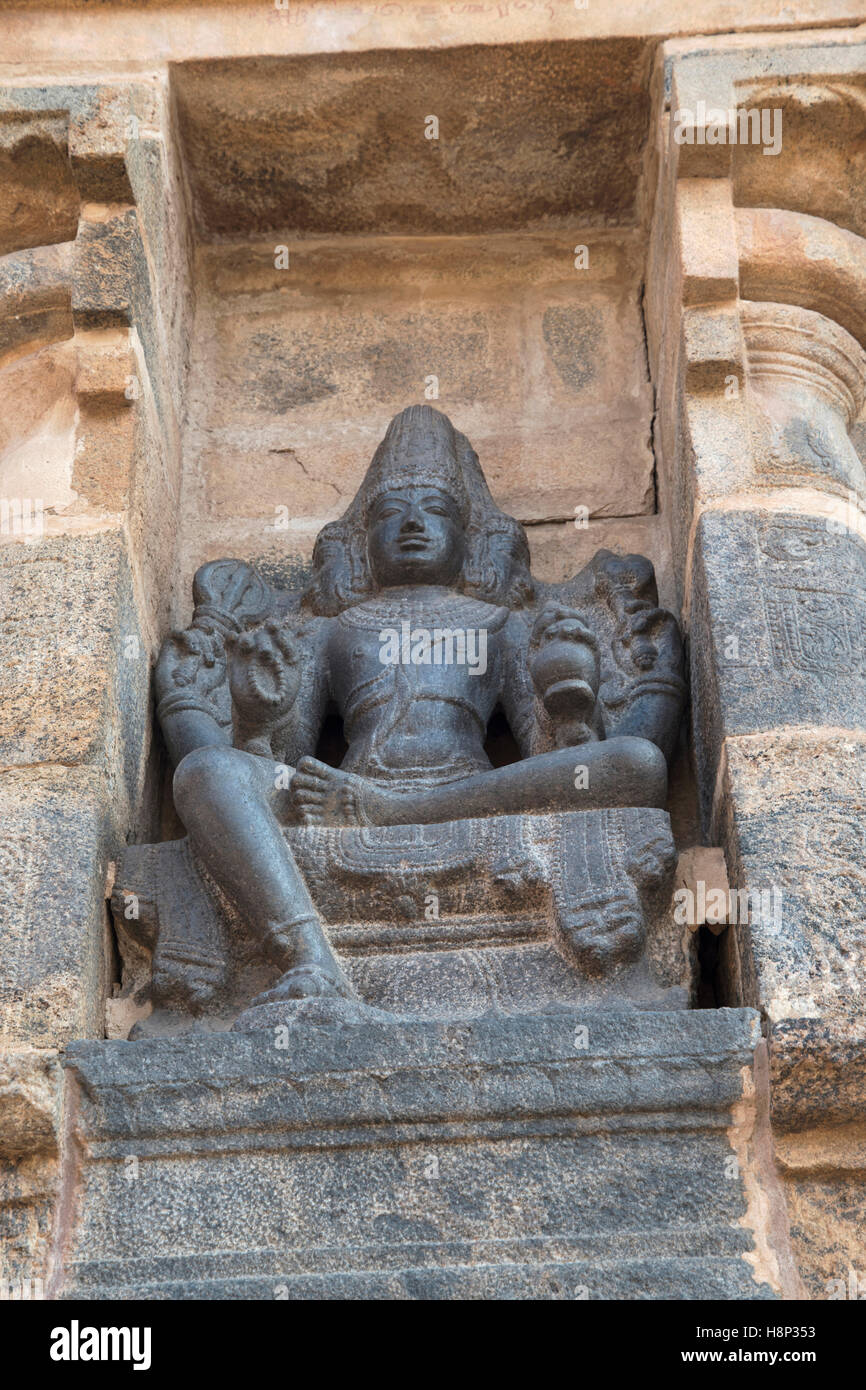 Three-faced candesa, Trimurti, niche in northern wall, Airavatesvara Temple complex, Darasuram, Tamil Nadu, India. Stock Photo