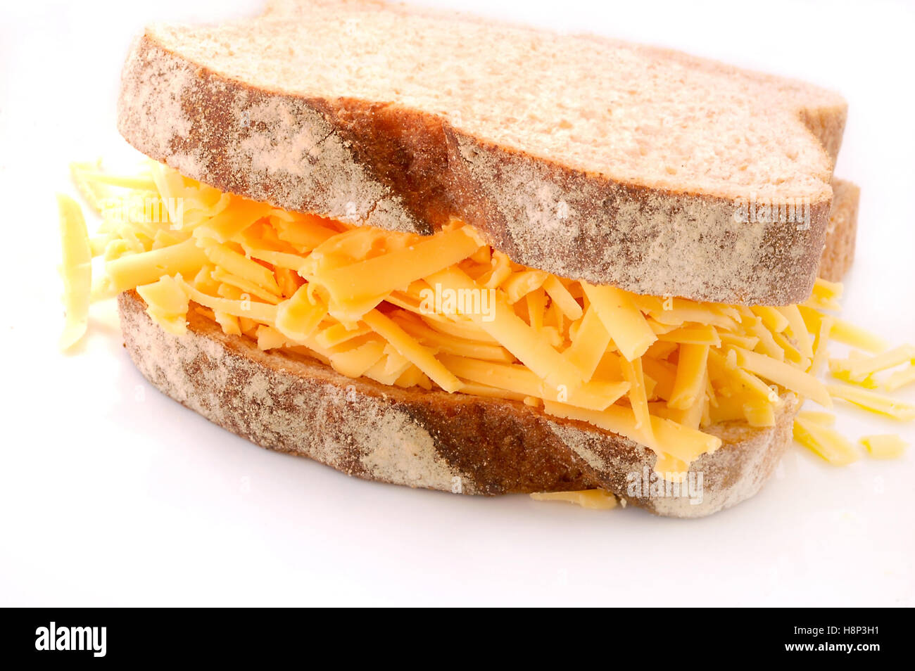 Delicious Cheese Sandwhich on Brown Bread Stock Photo