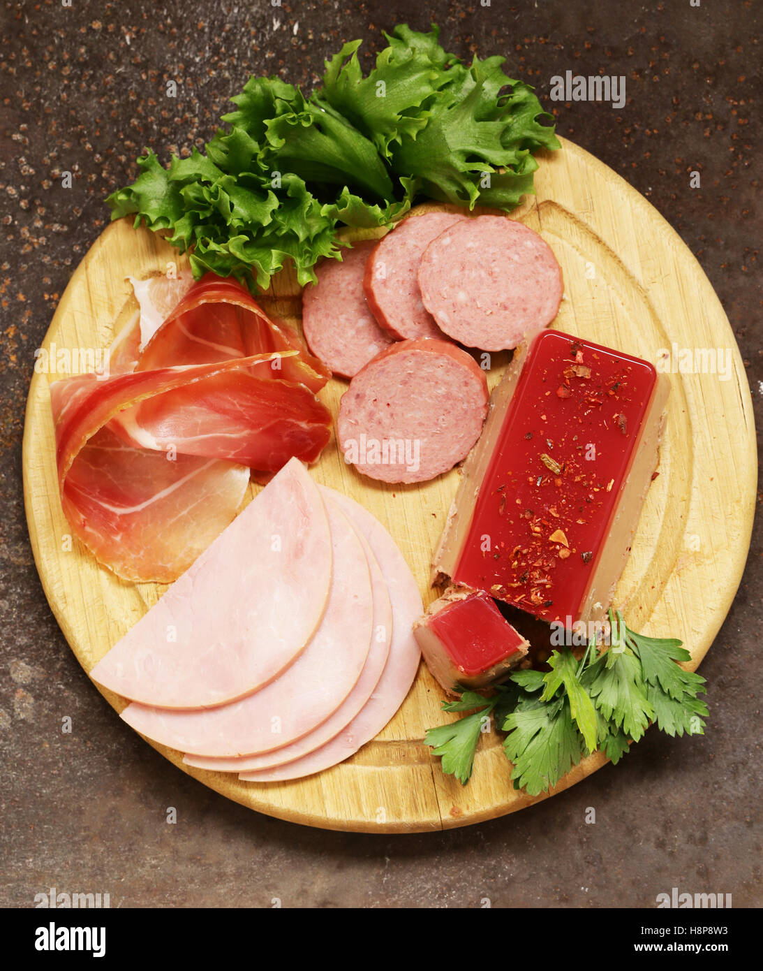 Assorted deli meats ham, salami, parma, prosciutto, pate Stock Photo
