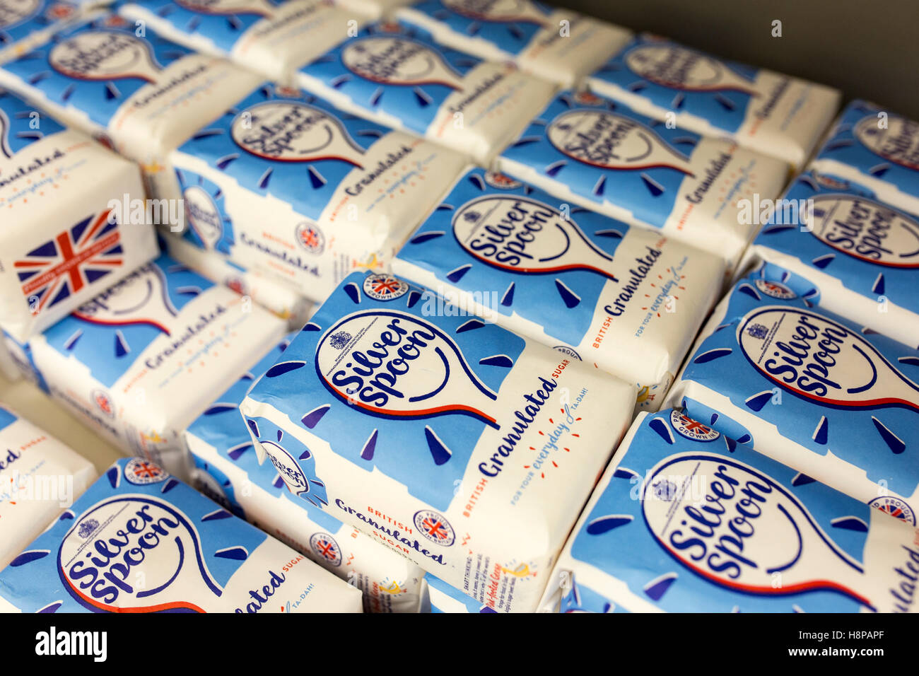 bags of Silver Spoon sugar inside a British supermarket store Stock Photo