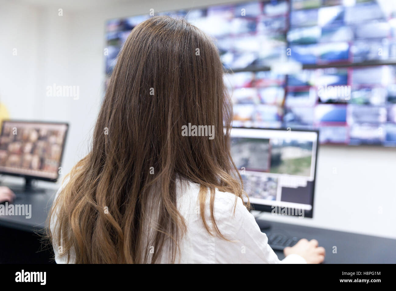 Control room operator. Security video surveillance Stock Photo Alamy