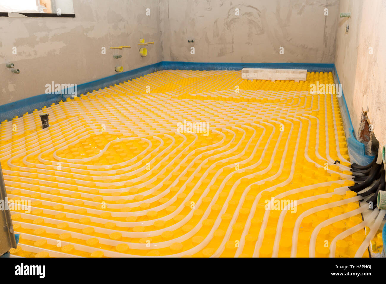 System floor radiant with polyethylene pipes Stock Photo