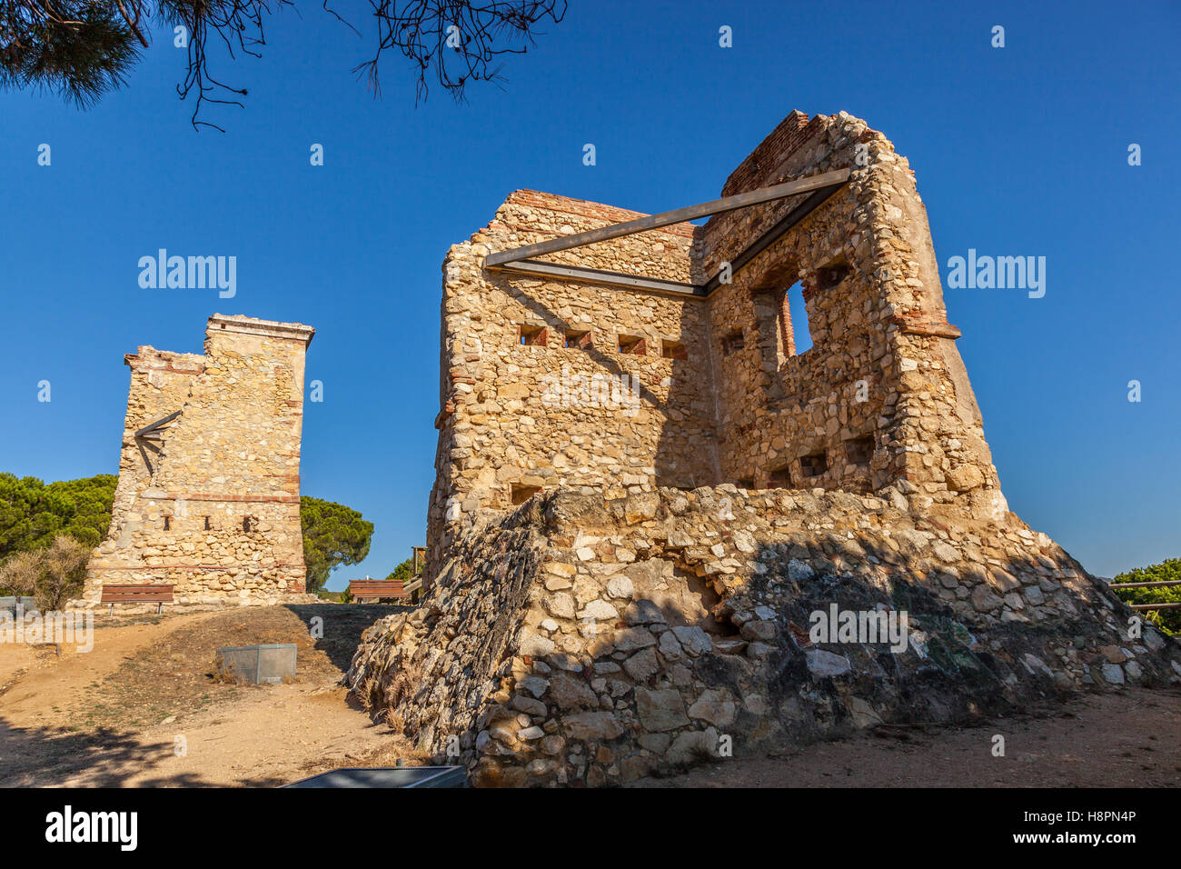 Ruins of old optical telegraph towers named Les Torretes near Calella - the semaphore towers were built in the mid-19th century. Stock Photo