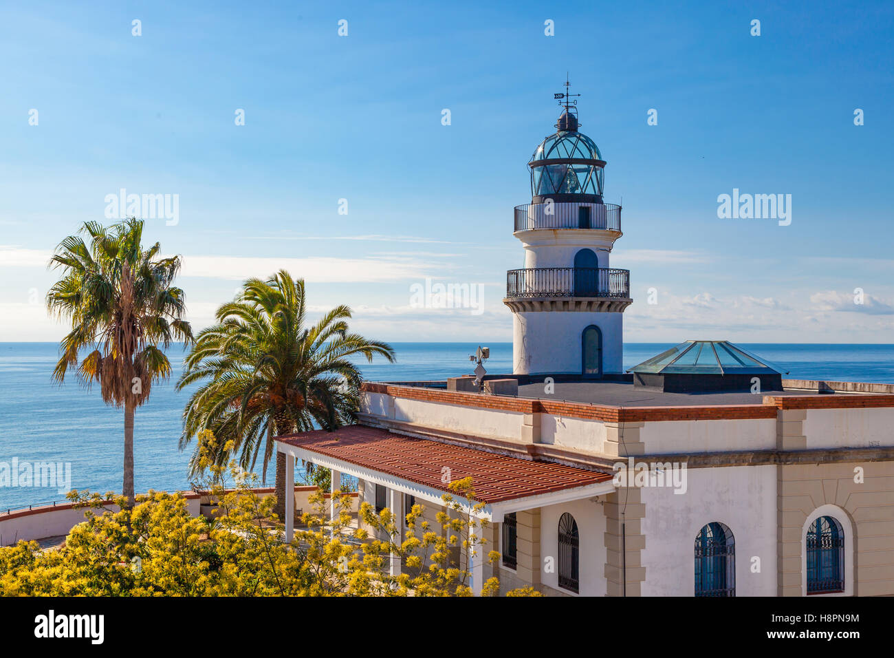 The famous lighthouse near Calella, Costa Brava, Spain, overlooking the blue Mediterranean Sea. Stock Photo