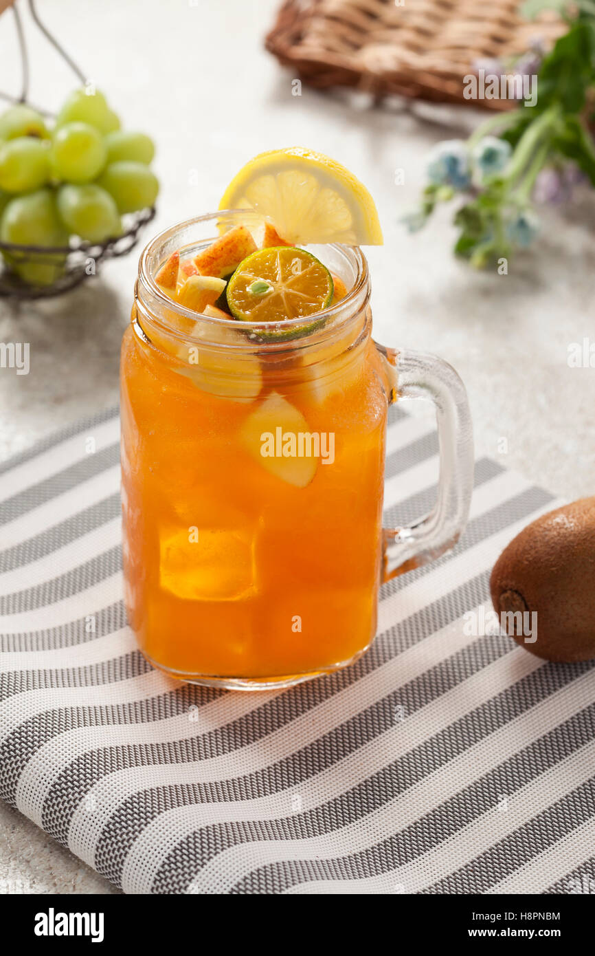 https://c8.alamy.com/comp/H8PNBM/jar-of-iced-tea-with-mixed-fruit-H8PNBM.jpg