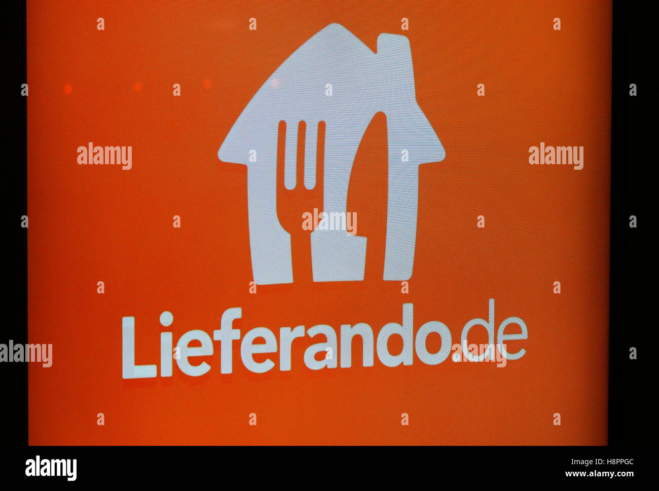 das Logo der Marke "Lieferando", Berlin. Stock Photo
