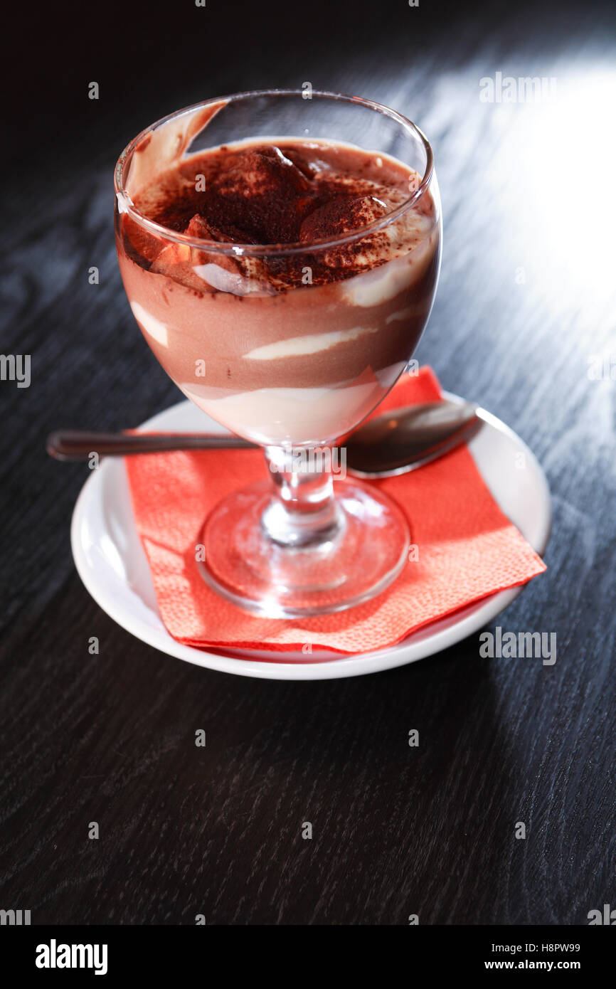Cottage Cheese Mousse With Chocolate In Goblet On Black Table