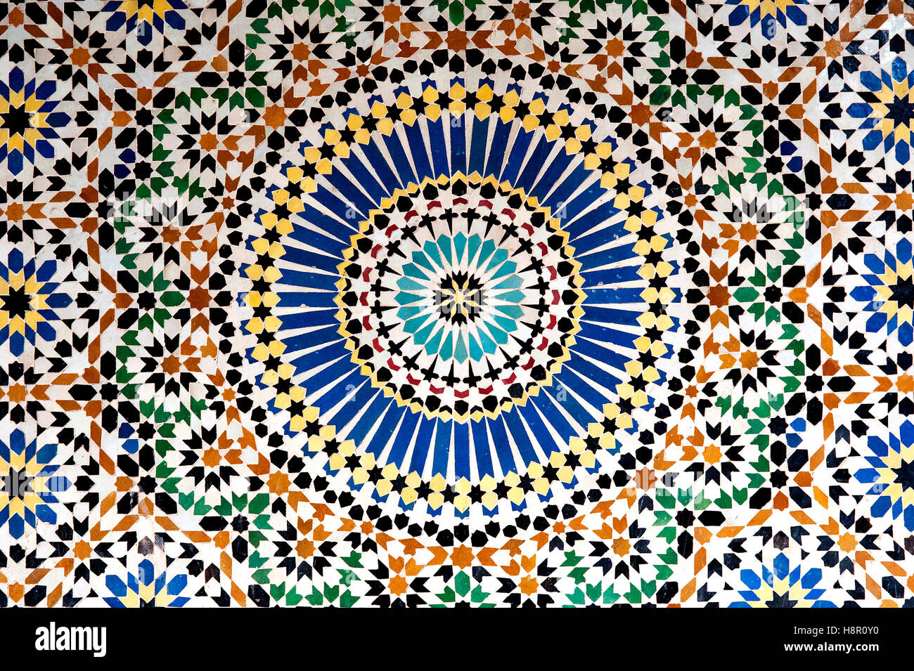 Mosaic, Kasbah Telouet, Morocco: the colorful geometric patterns of an Islamic mosaic decorate the walls the Kasbah Telouet. Stock Photo