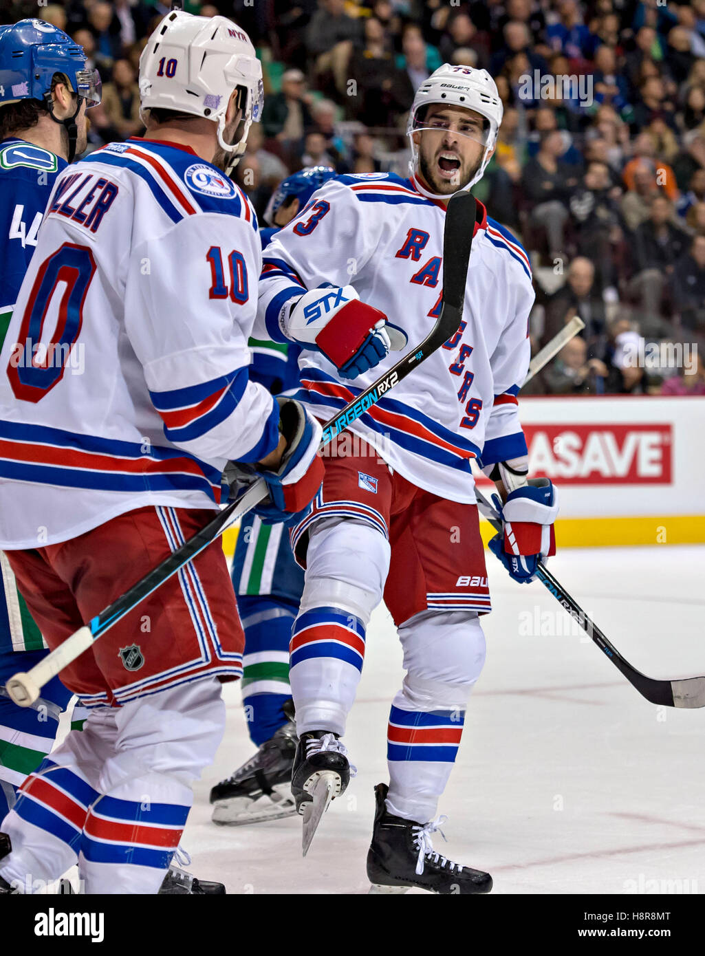 Vancouver, Canada. 15th Nov, 2016. New York Rangers' Brand Pirri(R) celebrates his goal against the Vancouver Canucks during the regular season match between the New York Rangers and the Vancouver Canucks in Vancouver, Nov. 16, 2016. The New York Rangers won 7-2. Credit:  Andrew Soong/Xinhua/Alamy Live News Stock Photo