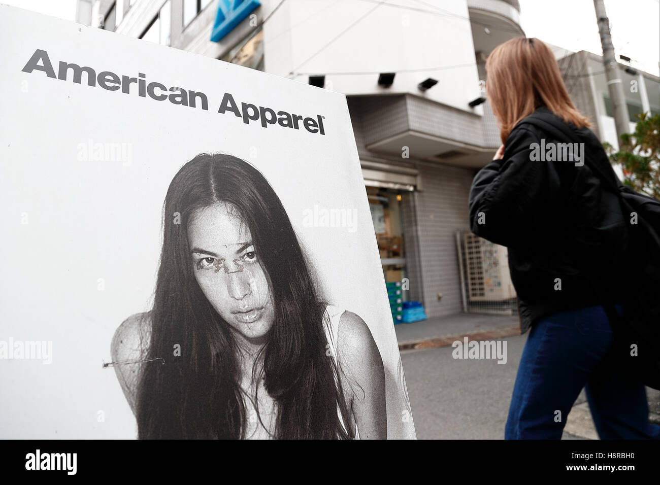 Tokyo Japan 16th November 16 A Woman Walks Past An American Apparel Signboard On Display In The Fashion District Of Shibuya On November 16 16 Tokyo Japan American Apparel Llc Filed For