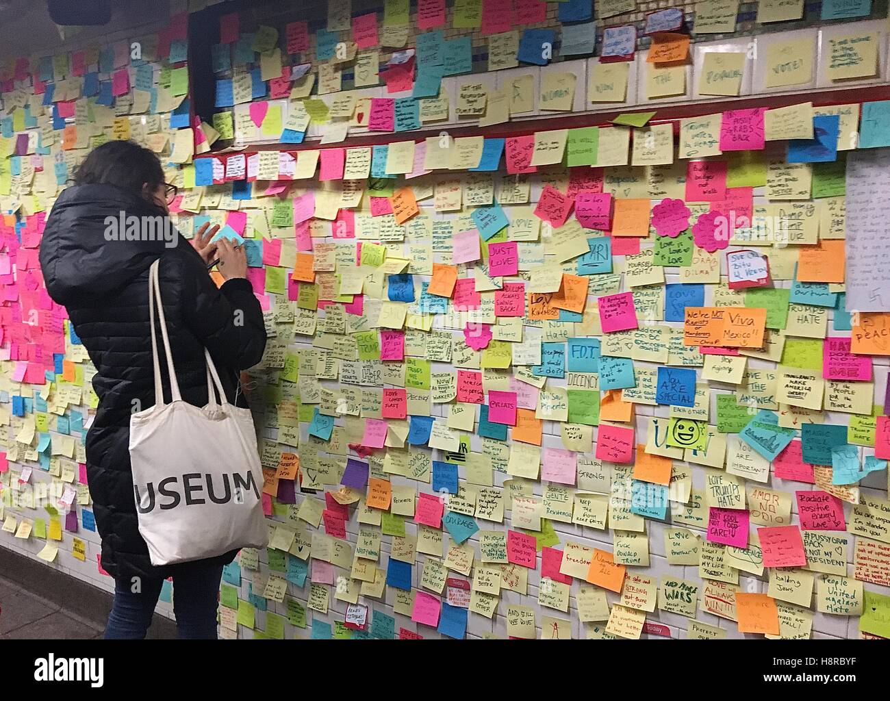 New York, NY, USA. 15th Nov, 2016. New Yorkers and others use the 'Subway Therapy' art project at the Union Square subway station to voice their views about the election and its possible effect on their lives by writing out their thoughts on sticky notes Stock Photo