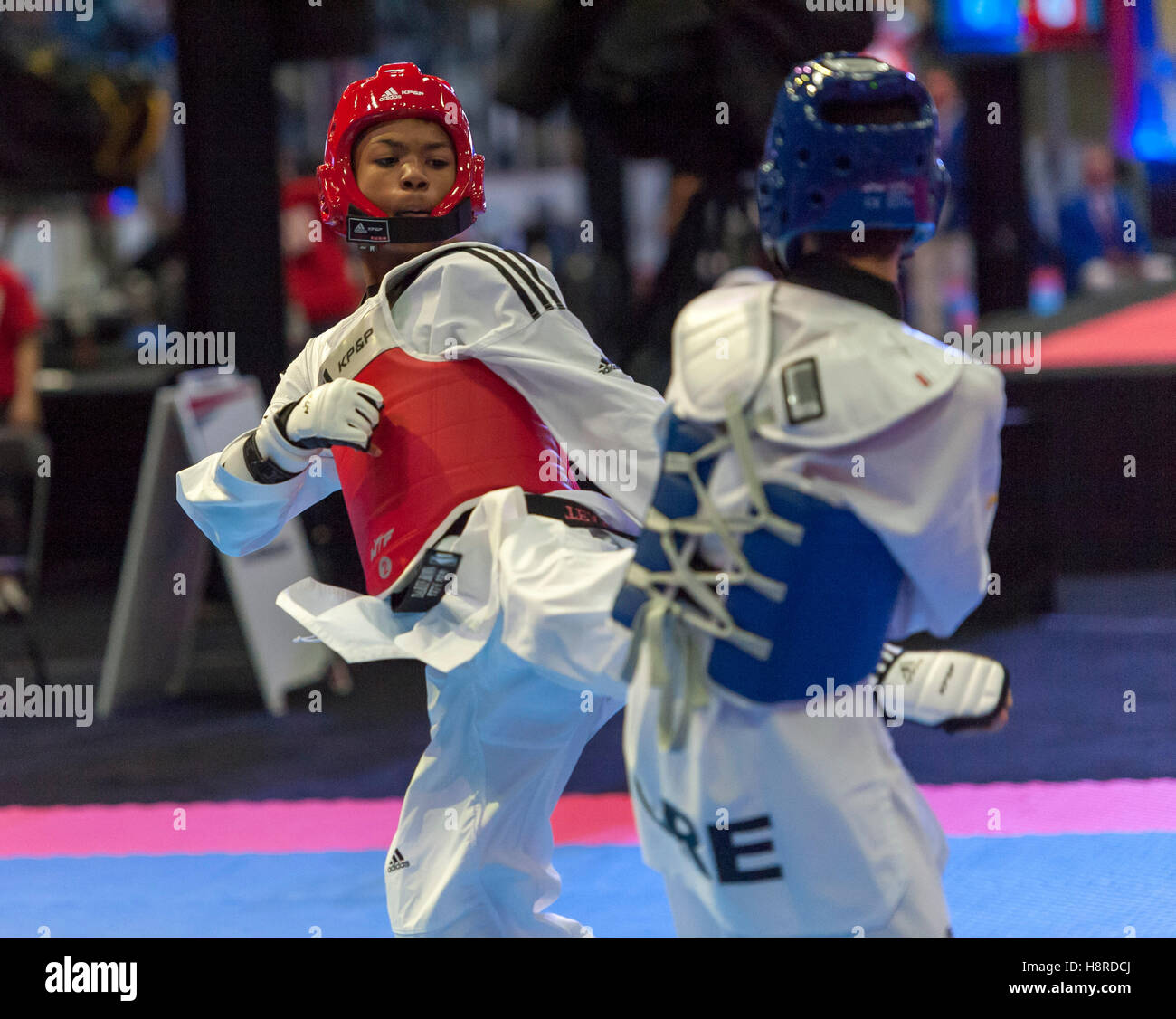 Burnaby, Canada. 16th Nov, 2016. WTF World Taekwondo Junior Championships, Georgios Ioannou (GRE) in blue and Darius Brown (CAN) in red compete in 48kg class Credit: © Peter Llewellyn/Alamy Live News  Stock Photo