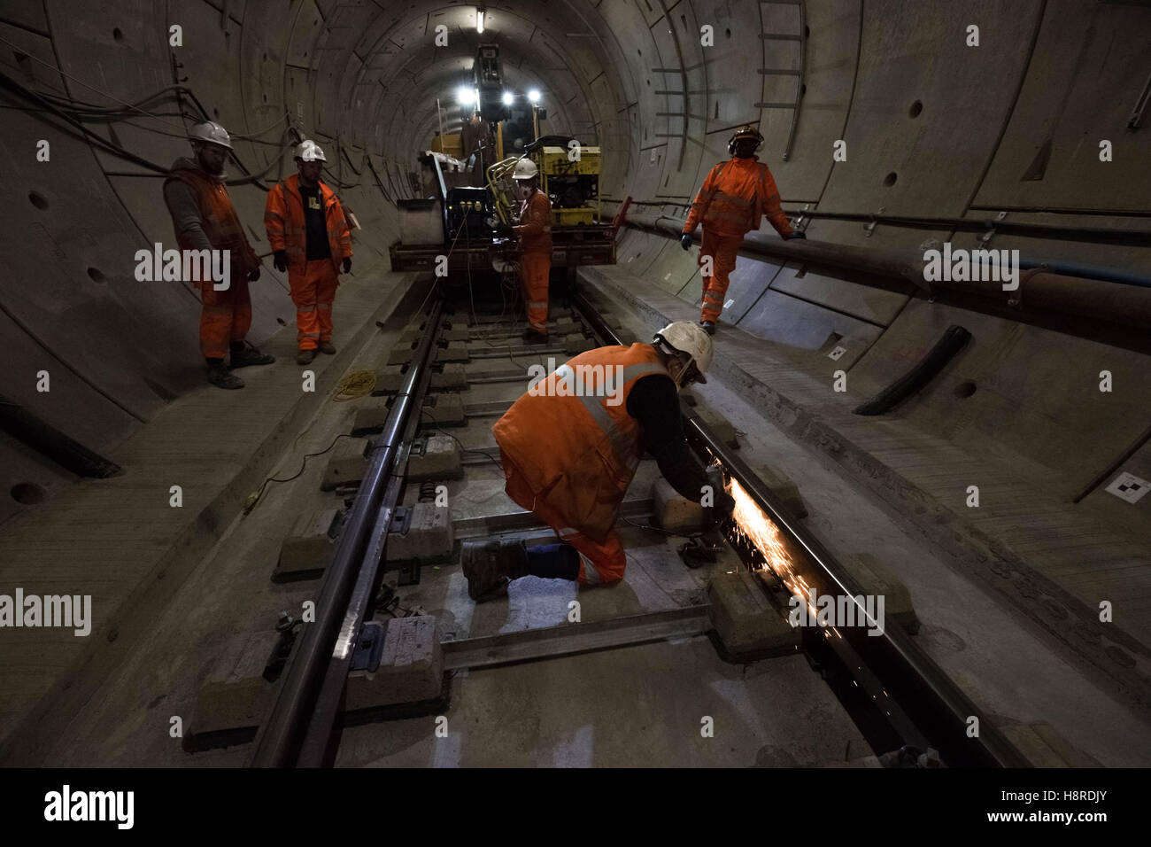 London, UK. 16th November, 2016. Crossrail Stepney Green station in East London. Westbound station. Workers grind and smooth the recently laid train tracks in preparation for join welding Credit:  Guy Corbishley/Alamy Live News Stock Photo