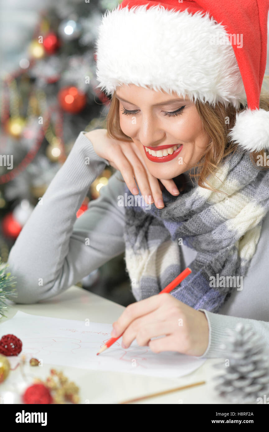 Woman writing a letter Stock Photo - Alamy