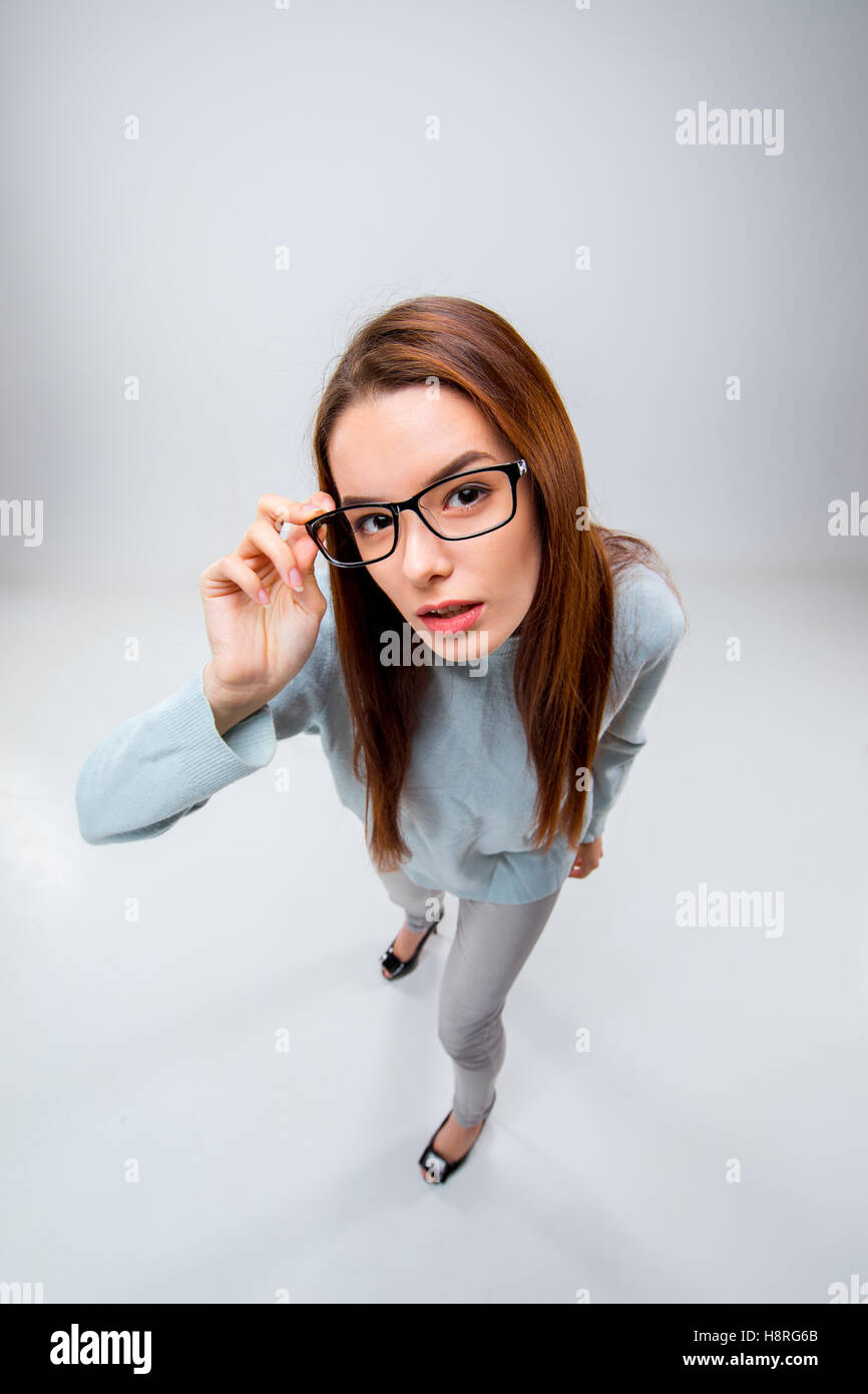 The young business woman on gray background Stock Photo - Alamy