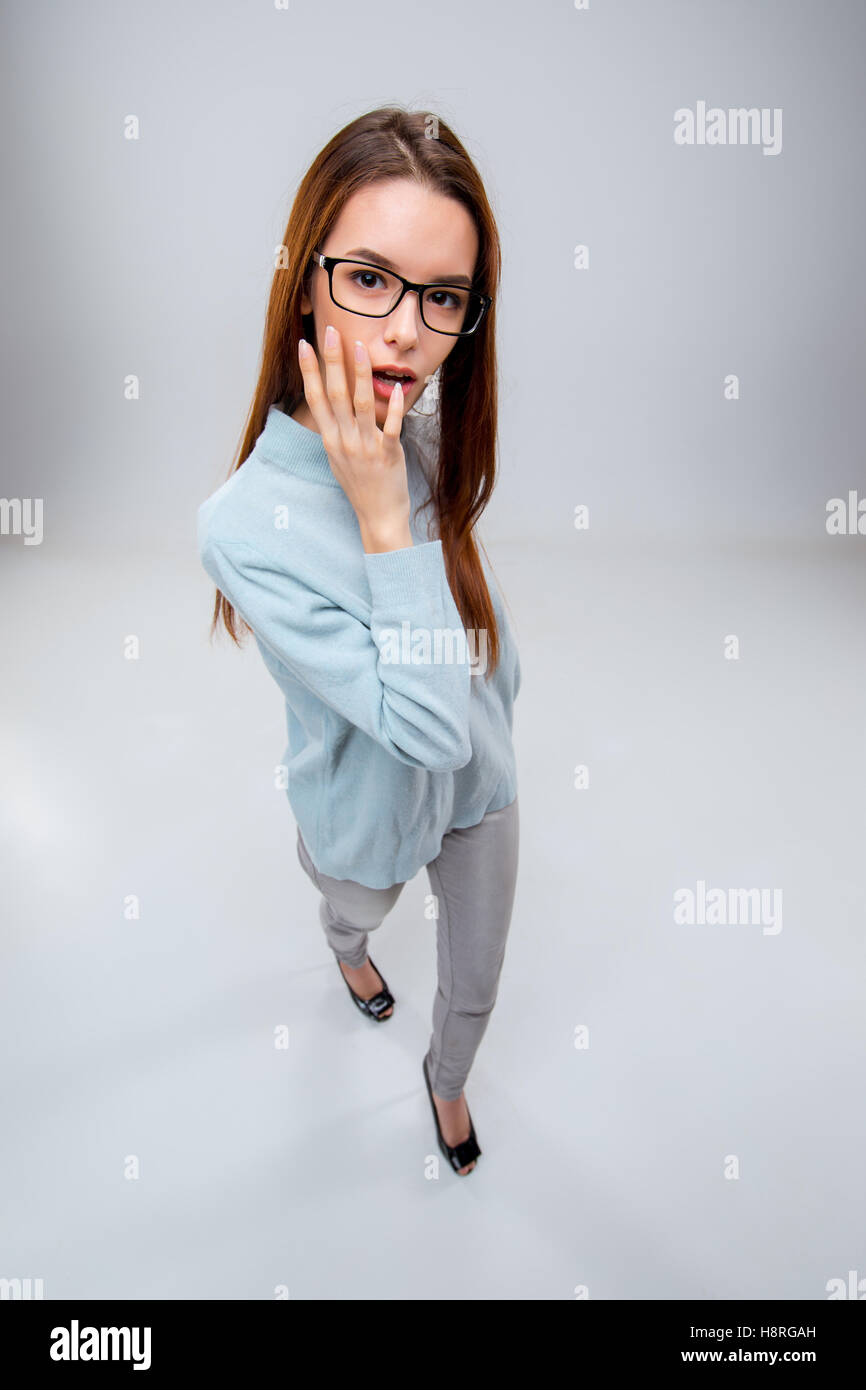 The young business woman on gray background Stock Photo - Alamy
