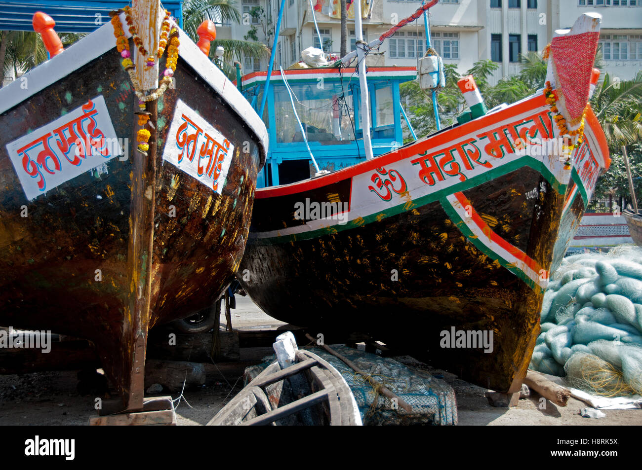 Fishing boats closeup on blocks displaying the names of the boats and