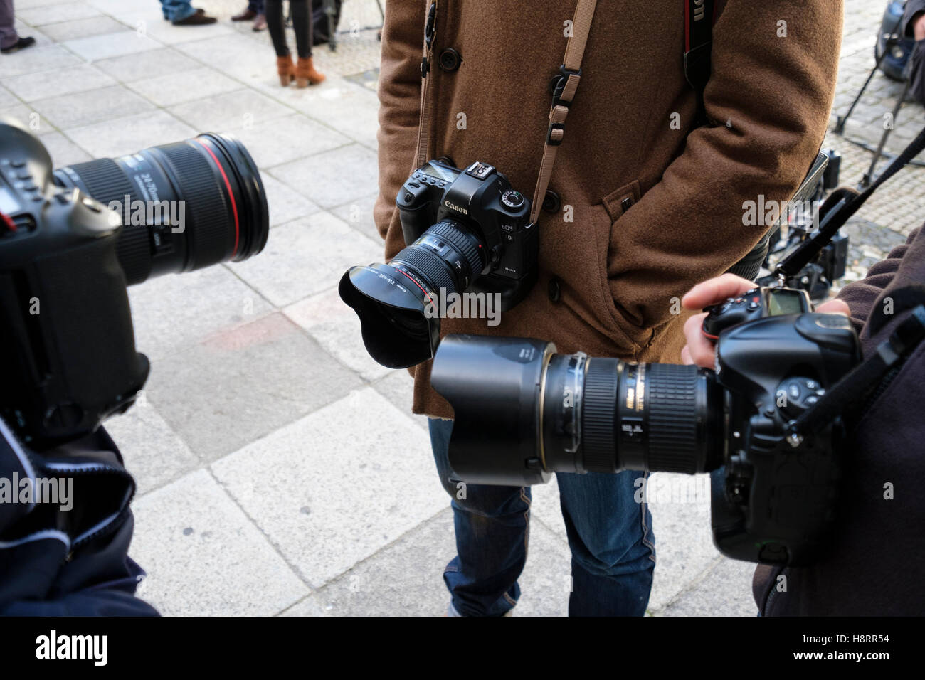 Professional photojournalists with their cameras Stock Photo