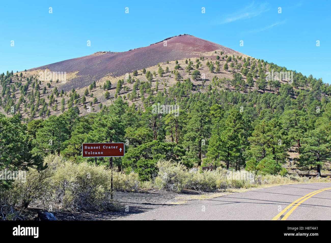 Sign and slope of the cinder cone at Sunset Crater Volcano National Monument north of Flagstaff, Arizona Stock Photo