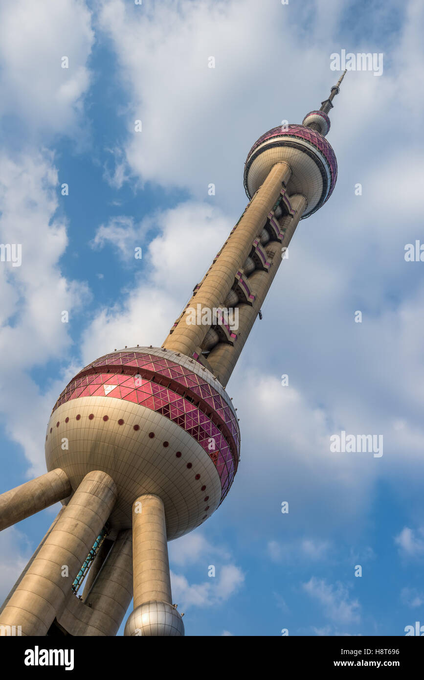 Oriental Pearl Tower with cloudy blue sky background, Shanghai, China Stock Photo