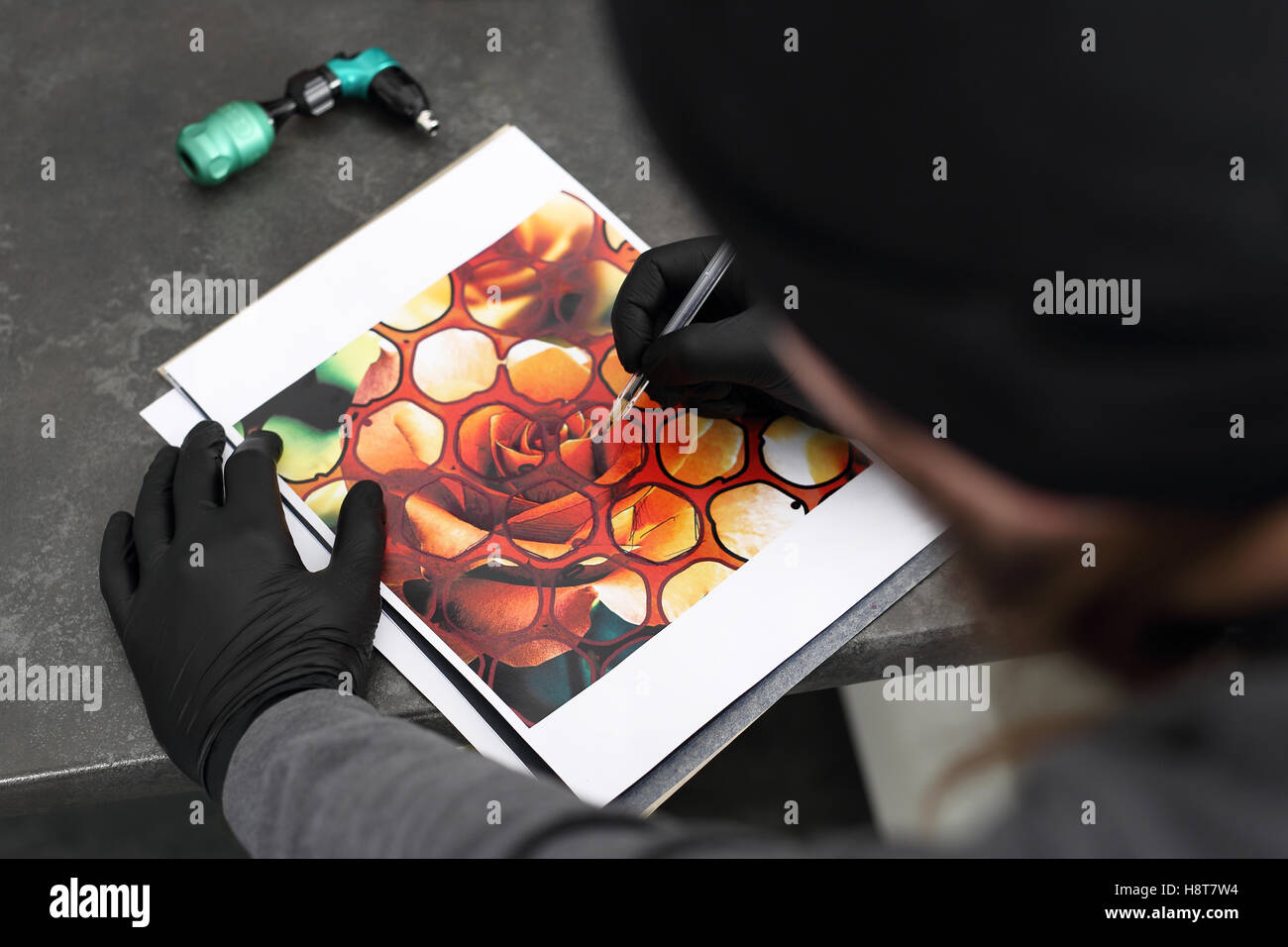 Tattoo transfers pattern on tracing paper. Stages of creating a tattoo