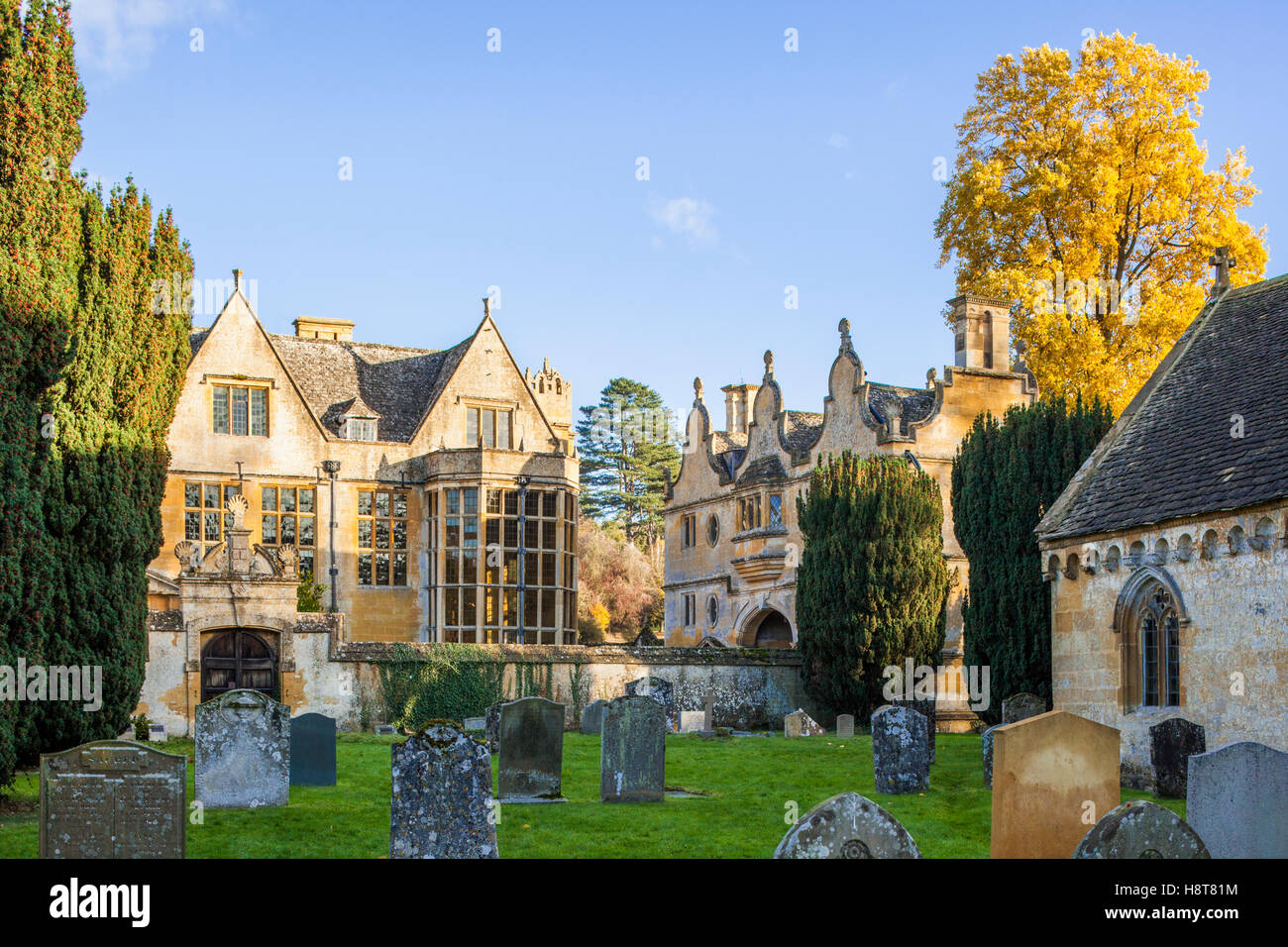 Autumn in the Cotswolds - Stanway House and gatehouse from the churchyard, Stanway, Gloucestershire UK Stock Photo